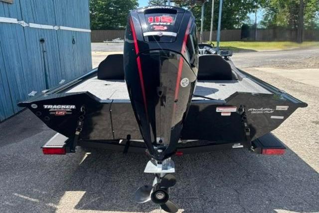 2023 Tracker Pro Team 190 TX Tournament Edition boat with Mercury engine, parked outdoors.