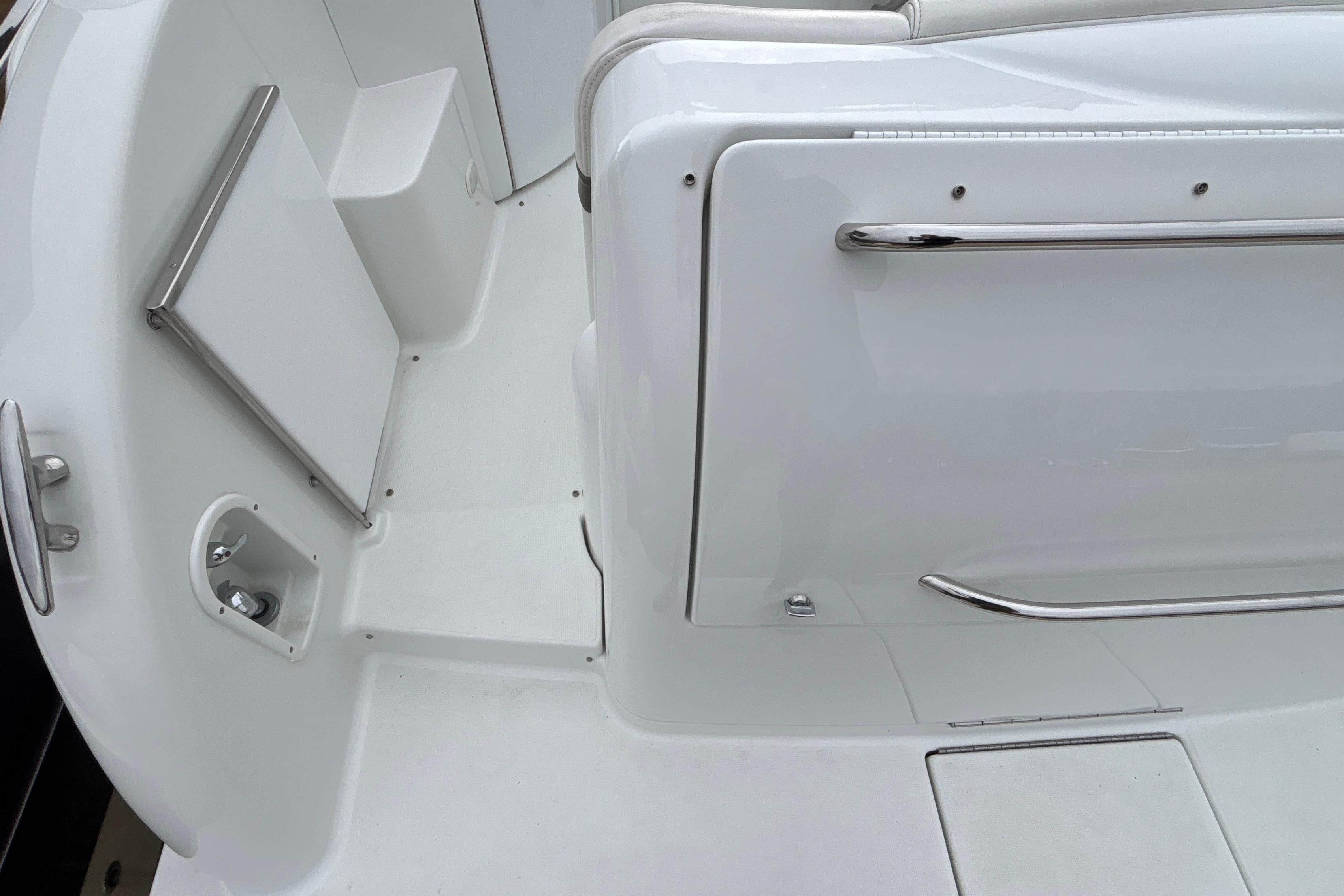 2005 Formula 31 Performance Cruiser interior with white seating and chrome accents.
