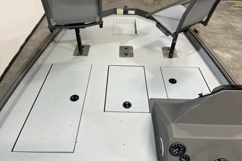 2026 SeaArk Flex 19 Pro boat interior with seating and storage compartments.