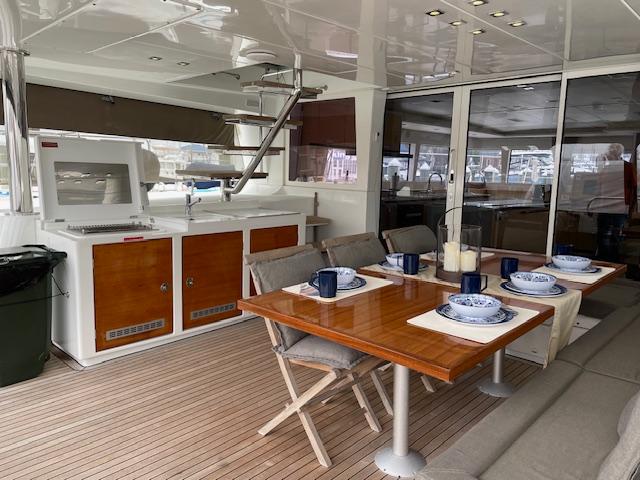 Luxurious dining area on Lagoon 620 catamaran, year 2014.