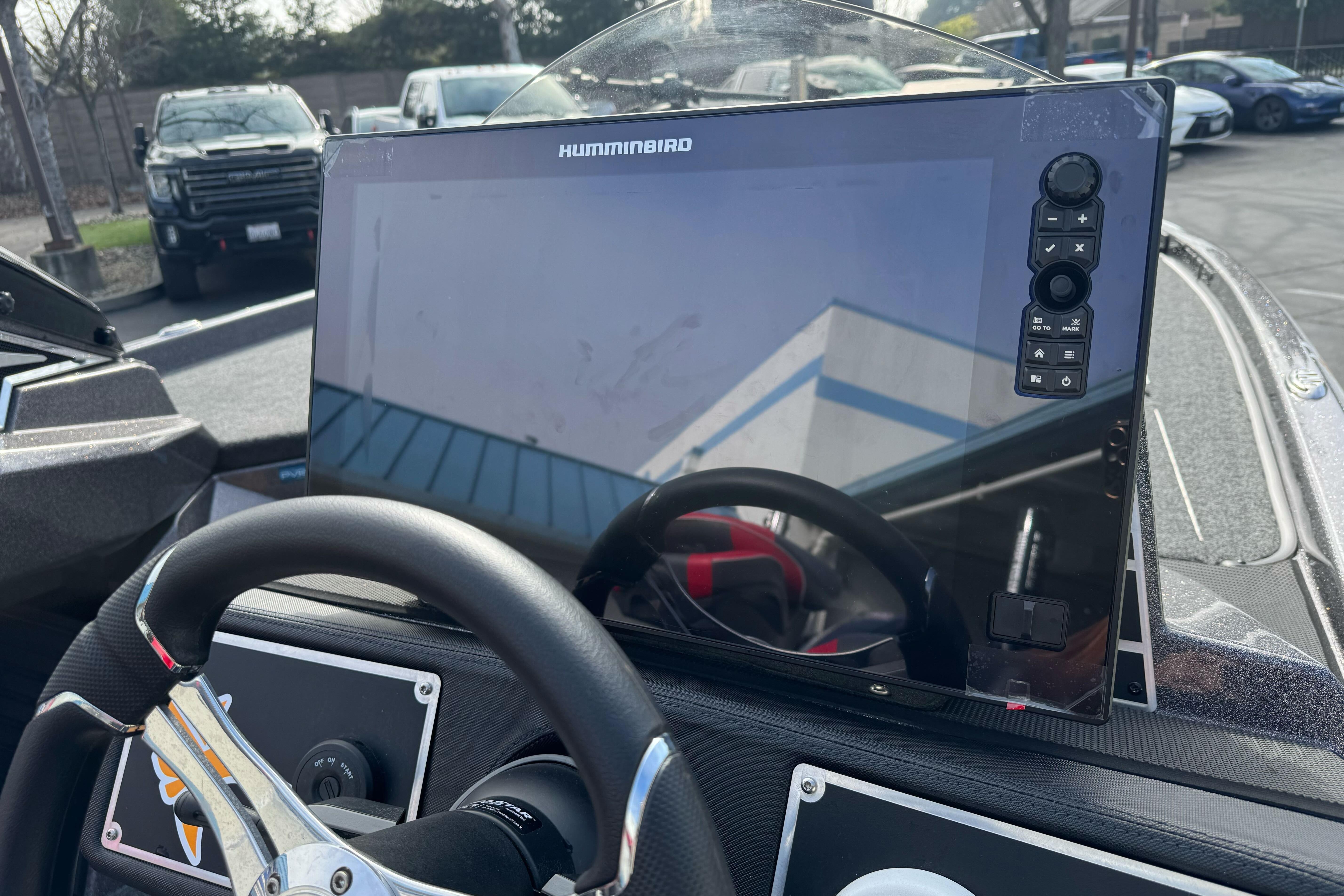 2025 Ranger Z521 boat dashboard with Humminbird display and steering wheel.