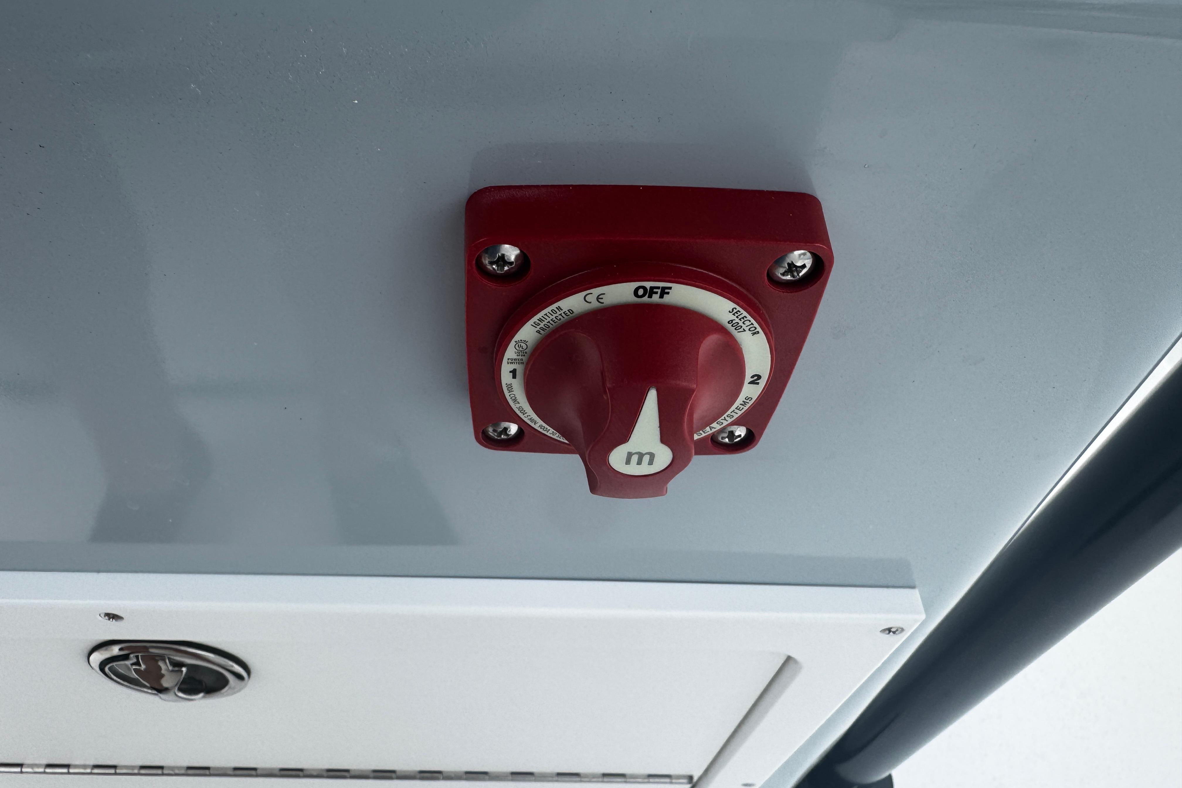 Red switch on Piranha Casador B2200, 2026 model, mounted on a gray panel.