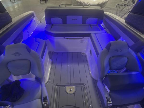 2025 Chaparral 267 SSX boat interior with blue LED lighting.