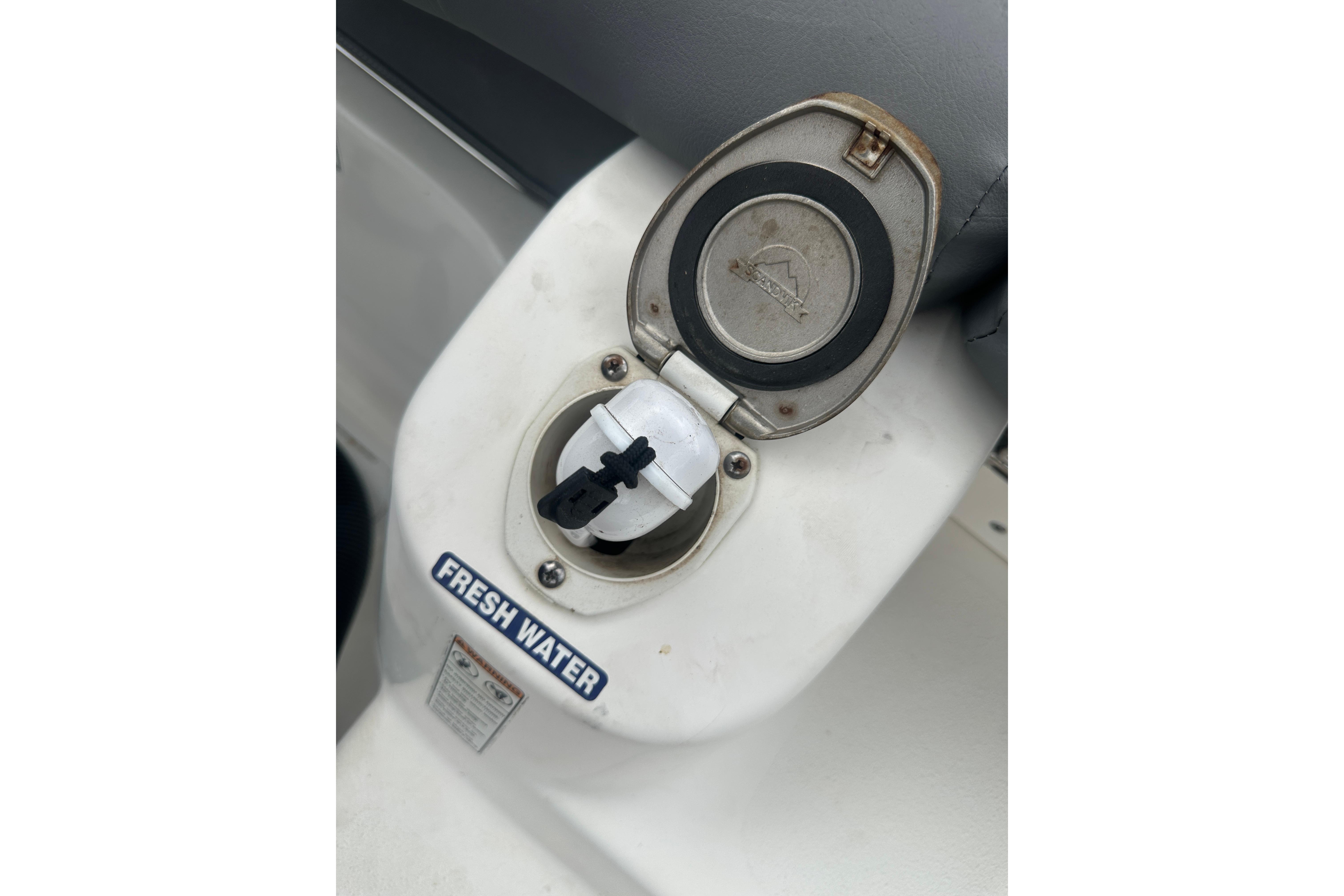 Fresh water access on 2023 NauticStar 2102 Legacy boat.