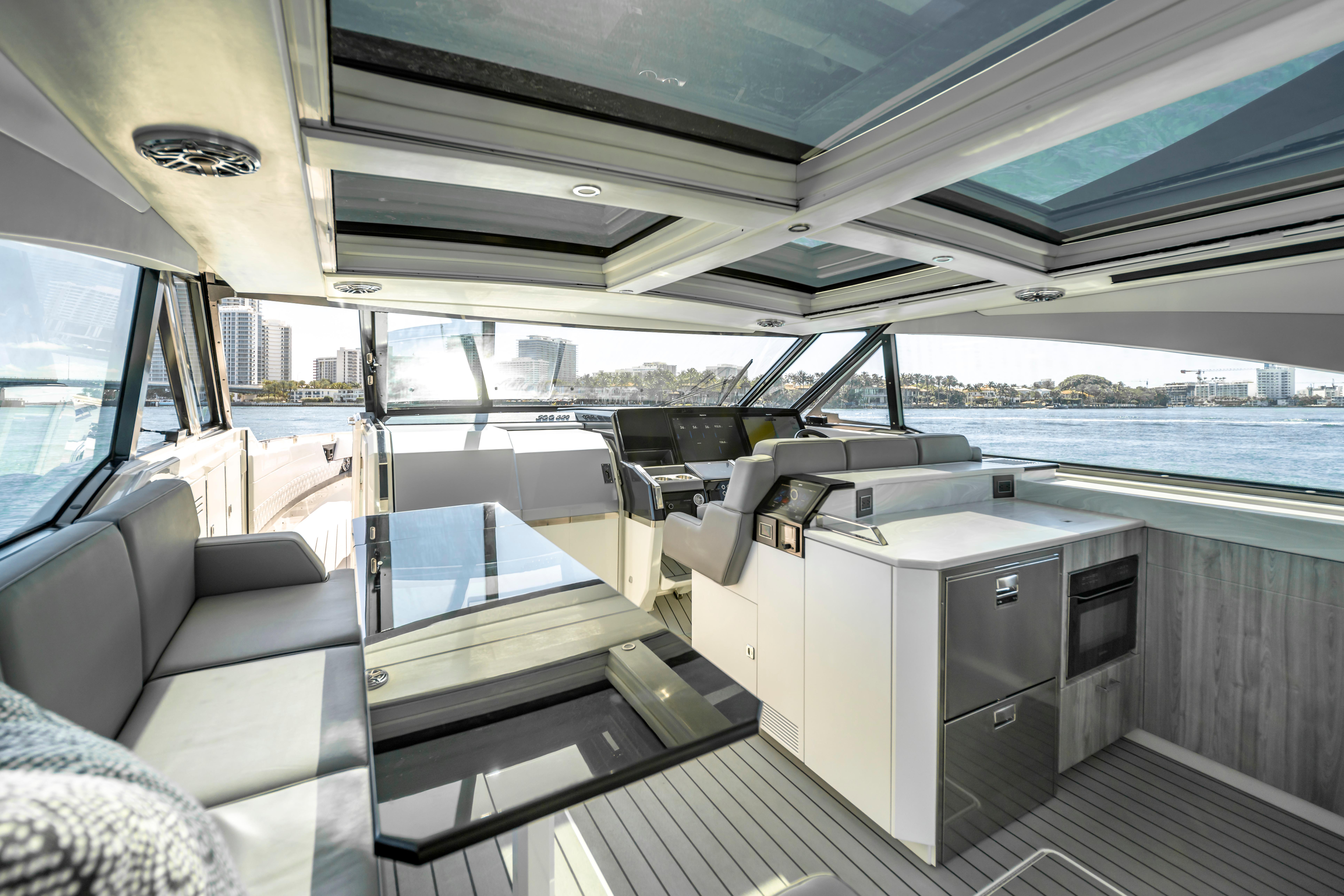Interior of 2022 Formula 500 Super Sport Crossover yacht with modern design and waterfront view.