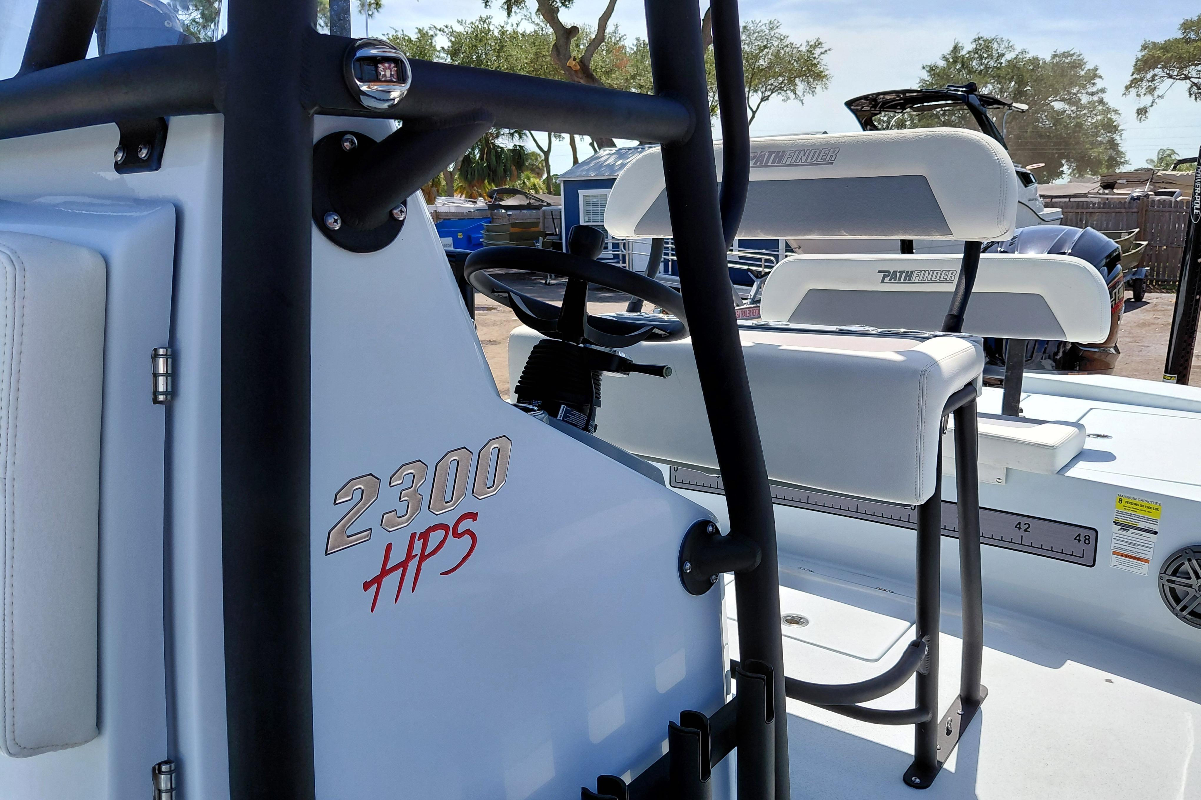 2022 Pathfinder 2300 HPS boat interior with seating and steering console.