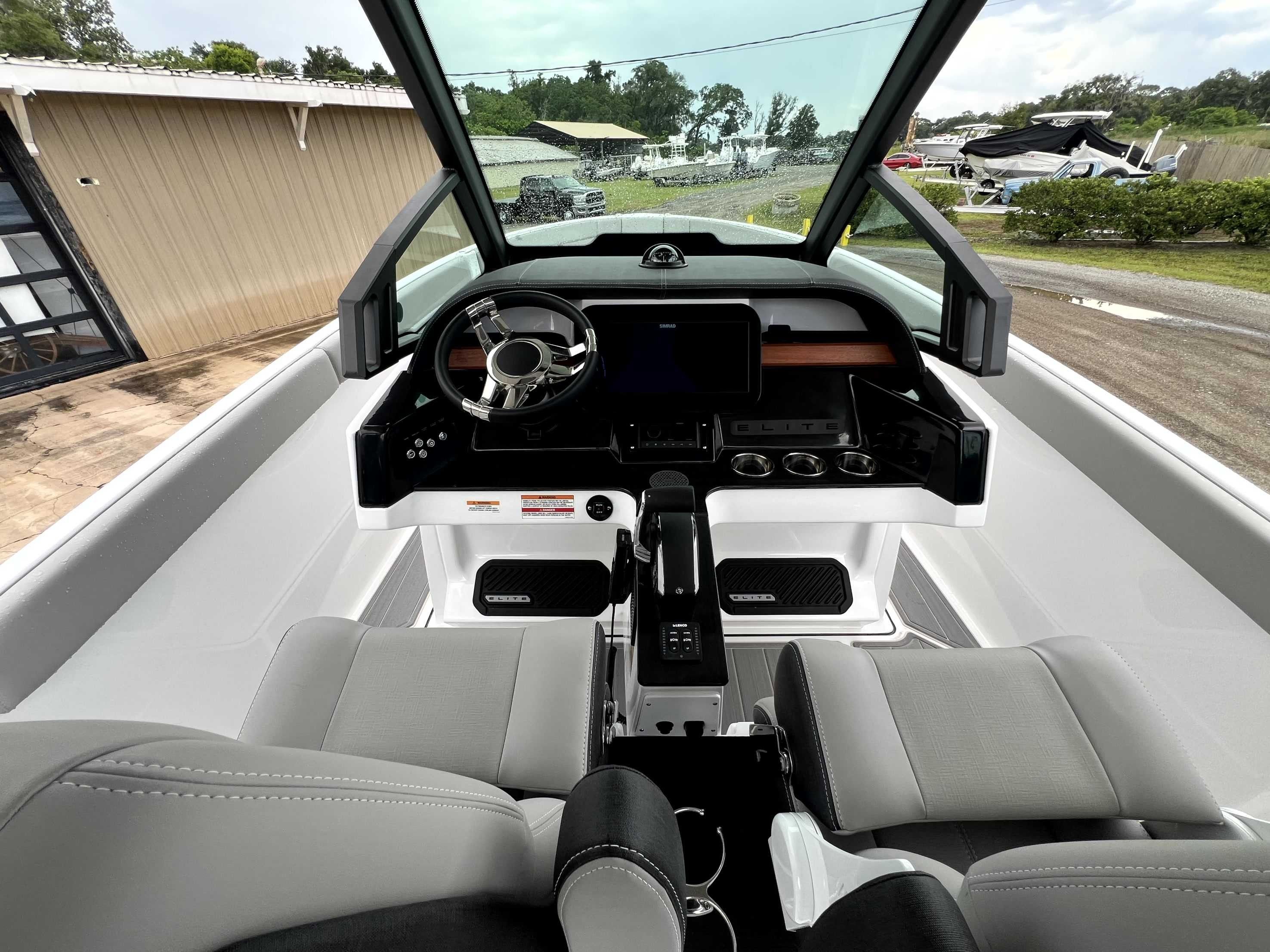 The cockpit of the 2026 Monterey Elite 25 features a modern steering wheel and digital dashboard.