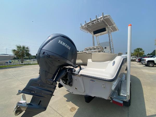 2024 Key West 203 FS boat with Yamaha outboard motor, rear view.