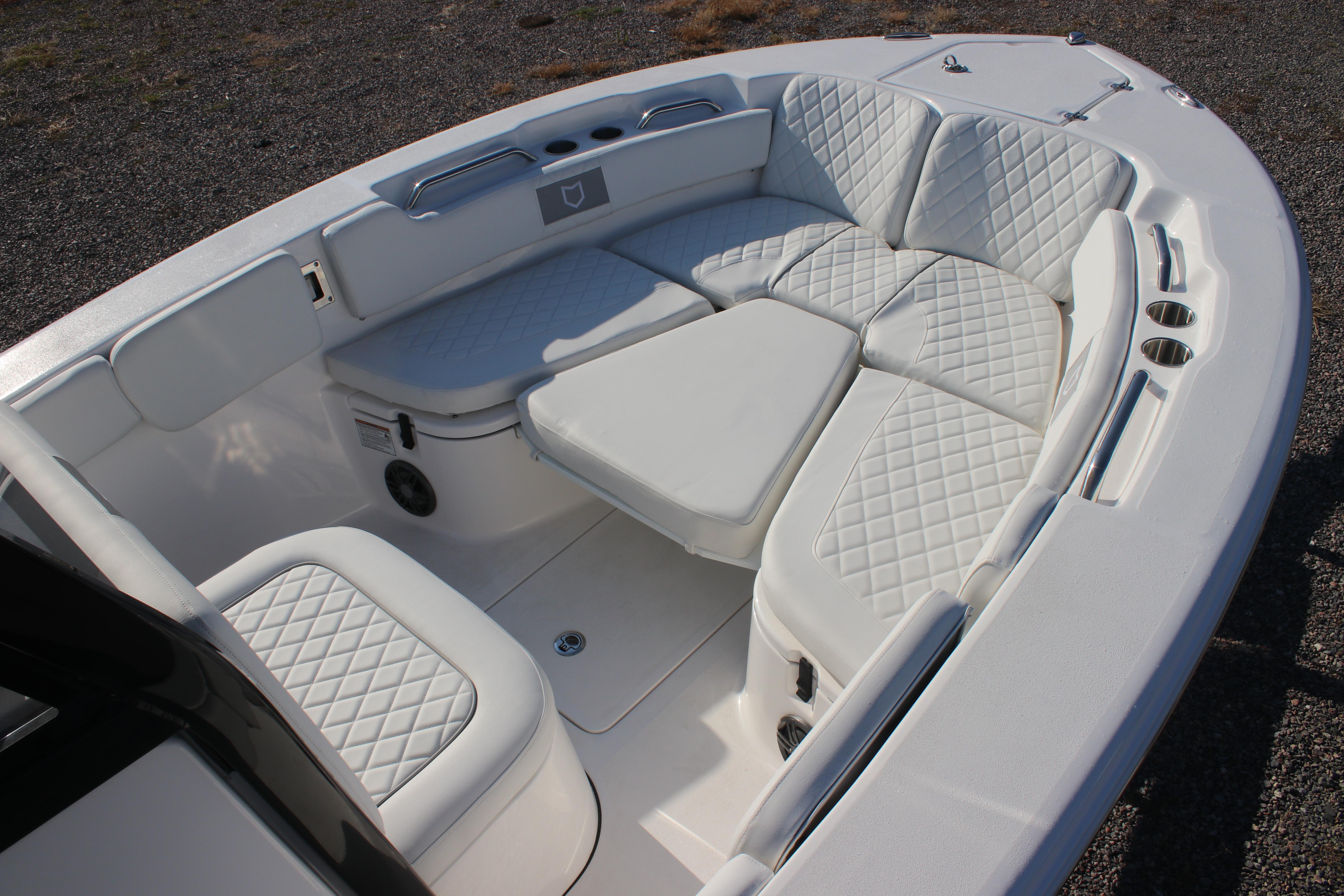 2026 Sea Fox 248 Commander boat interior with white quilted seating.
