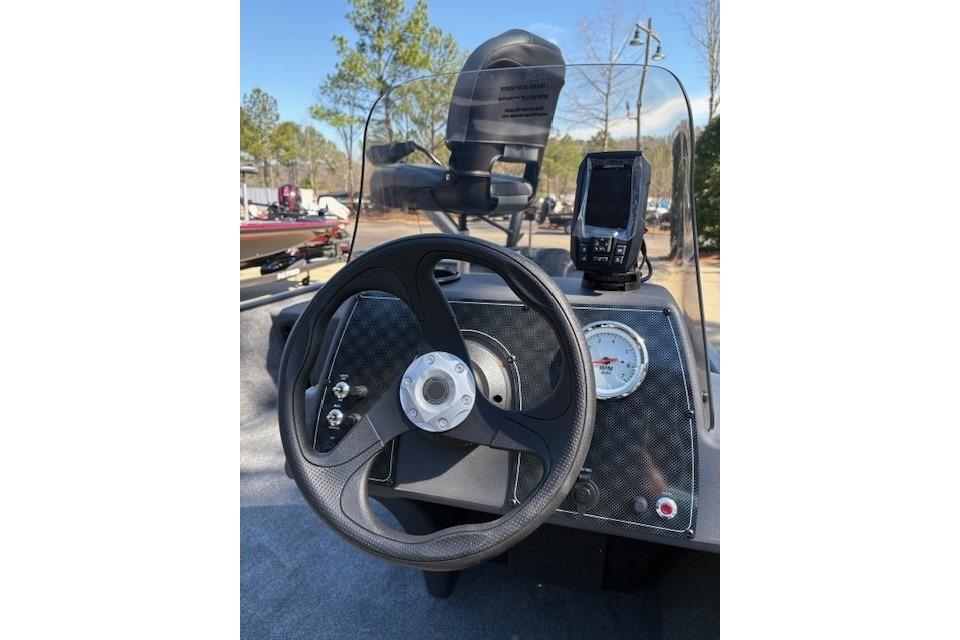 2026 Tracker Bass Tracker Classic XL dashboard with steering wheel and navigation display.