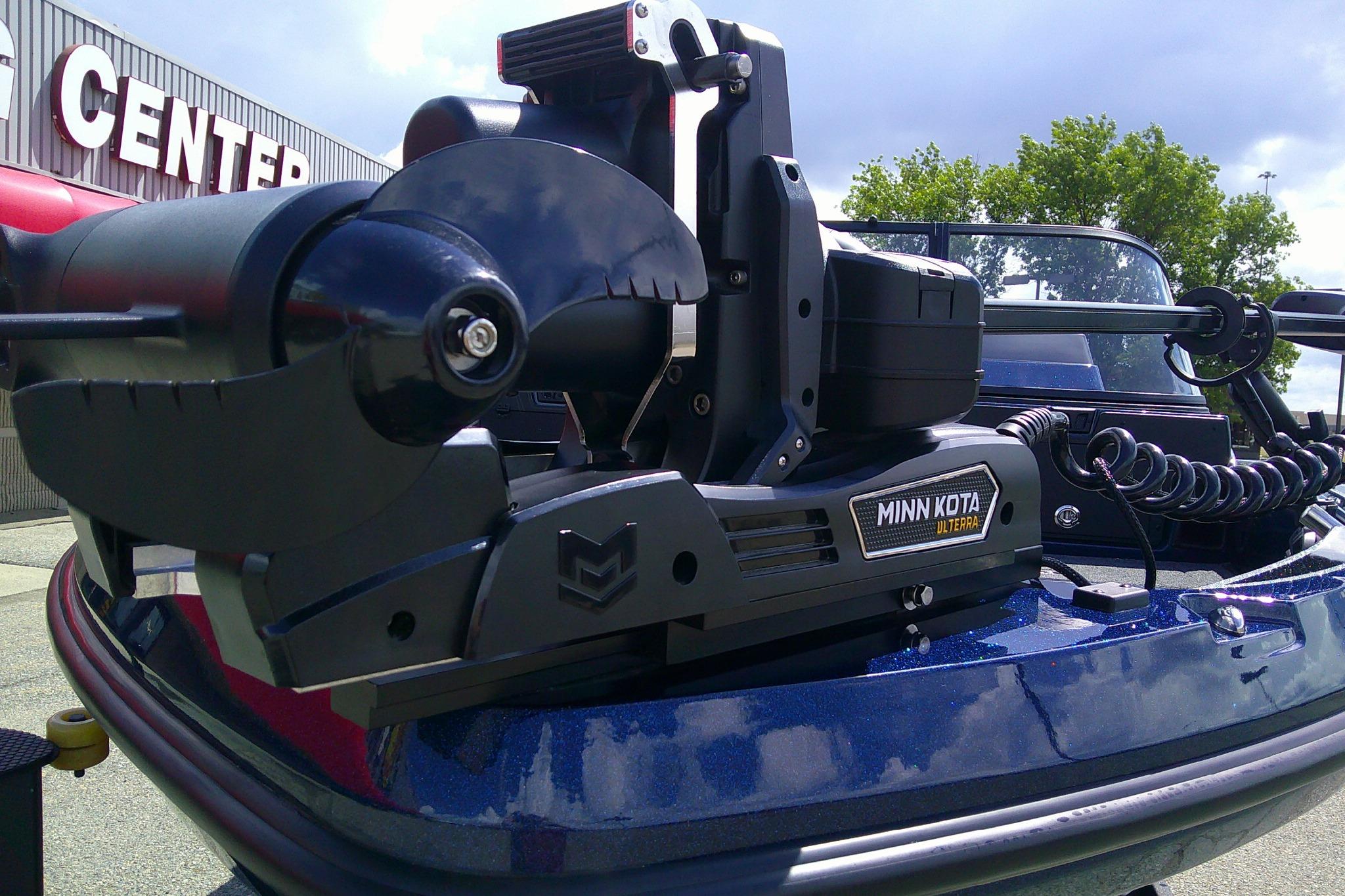 Minn Kota Ulterra motor on 2025 Nitro ZV20 Sport boat, parked outdoors.