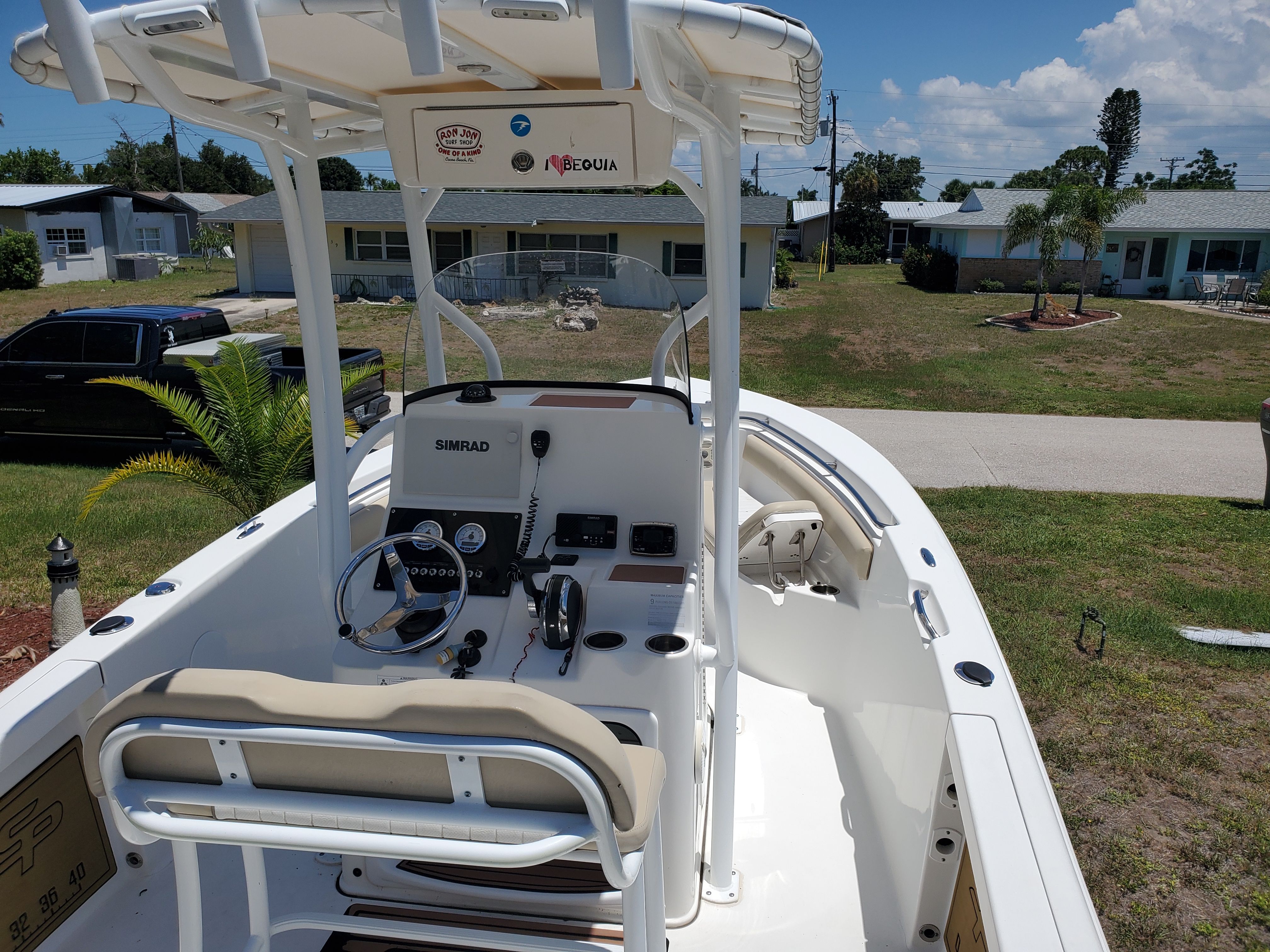 2017 Sea Pro 219 Center Console parked on a lawn.