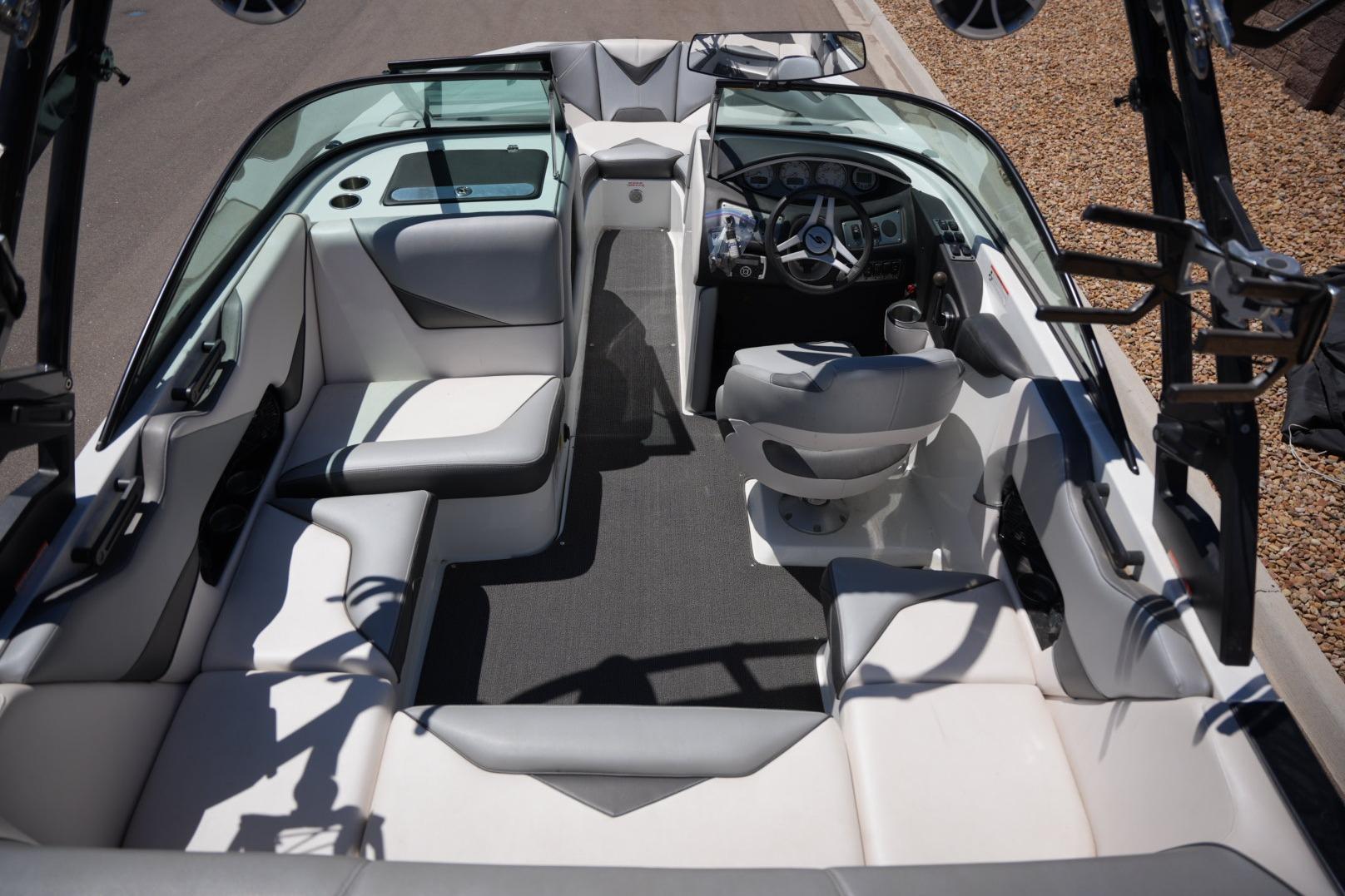 2016 Supreme S211 boat interior with sleek seating and modern dashboard design.