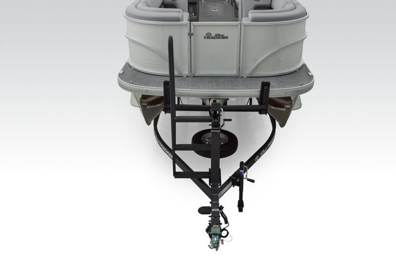 2026 Sun Tracker Party Barge 22 DLX pontoon boat on trailer, rear view.
