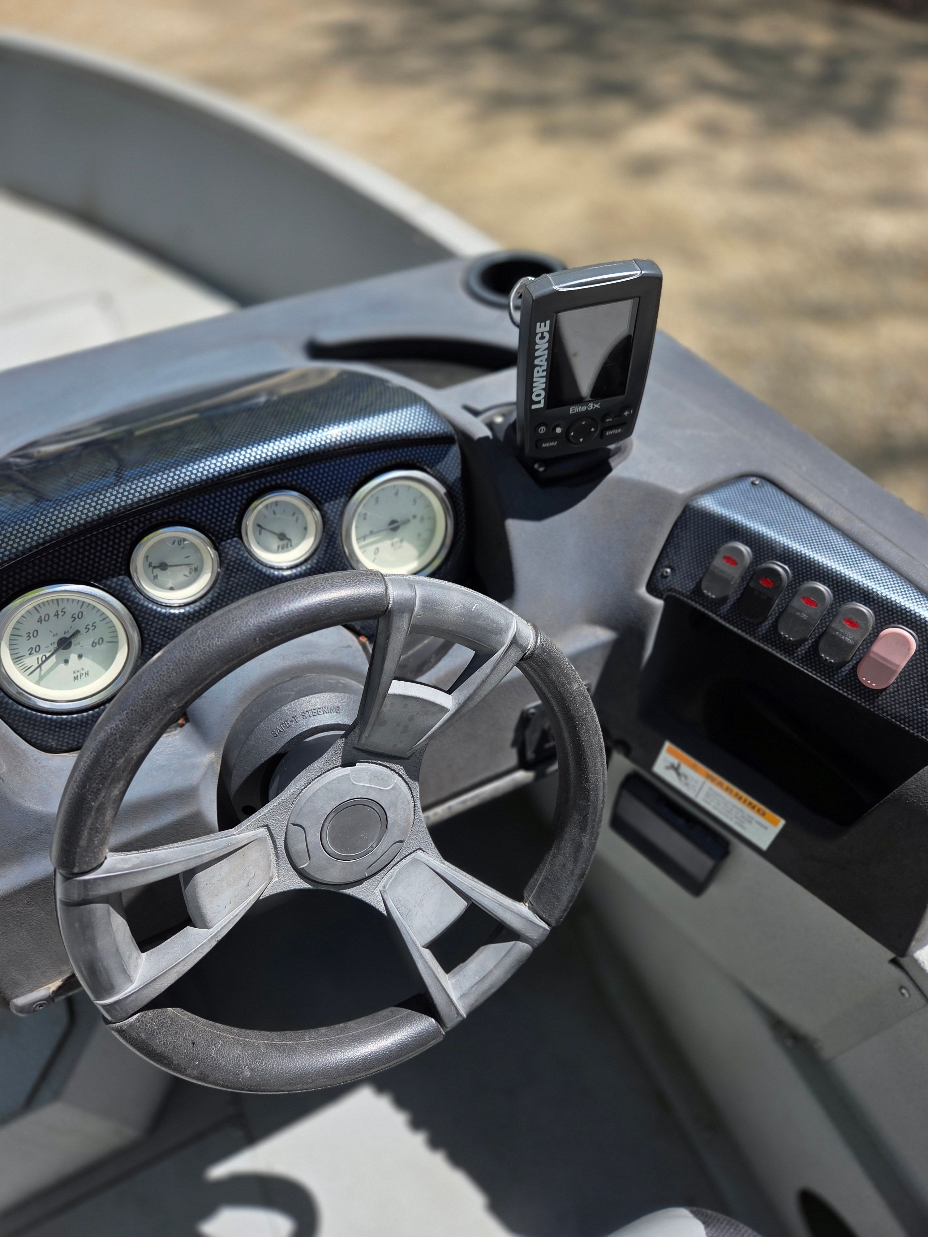 Lowe Fishing Machine 165 Poly Camo 2015 dashboard with instruments.