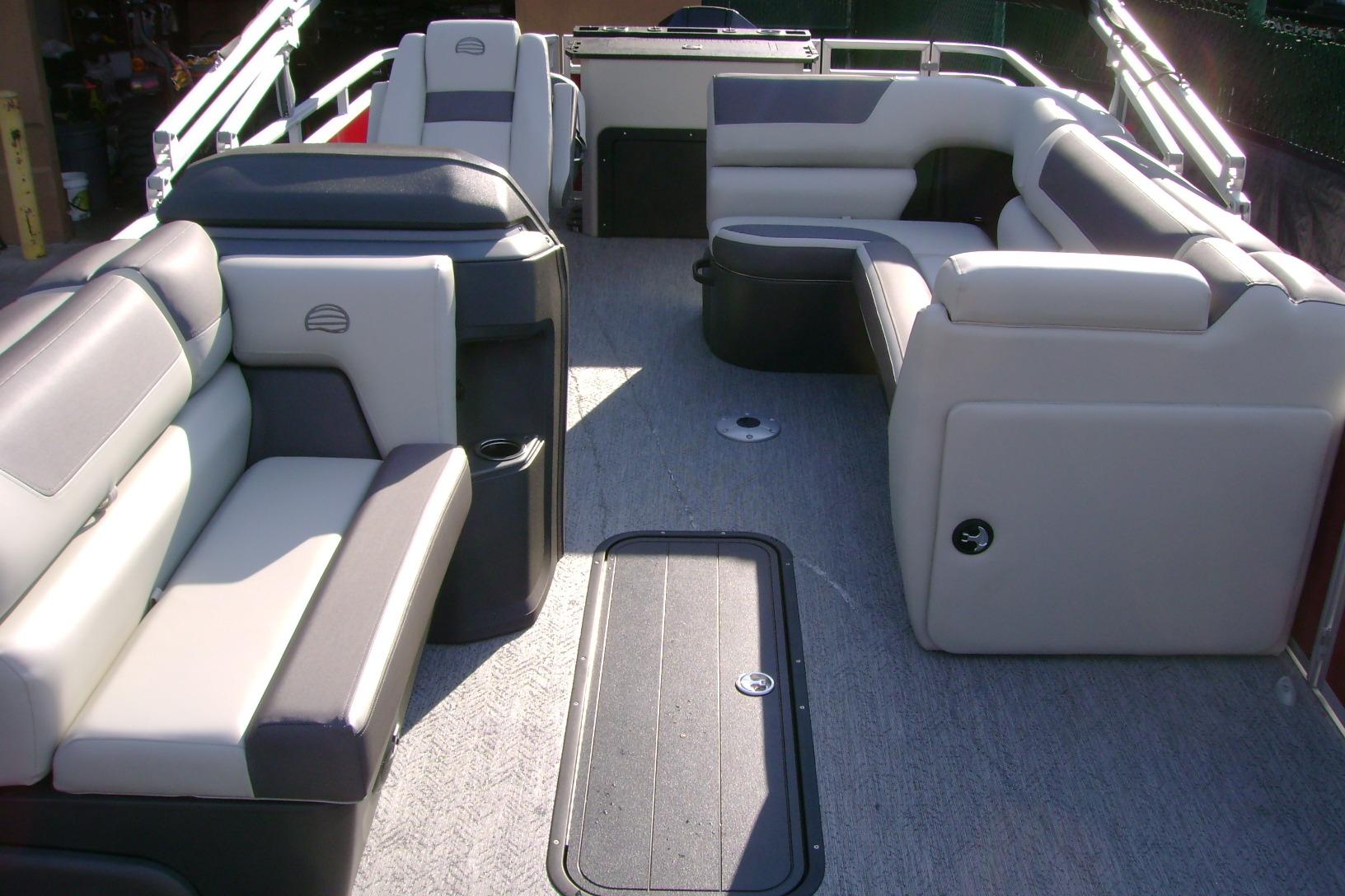 2026 Sun Tracker Fishin' Barge 22 XP3 interior with spacious seating and modern design.