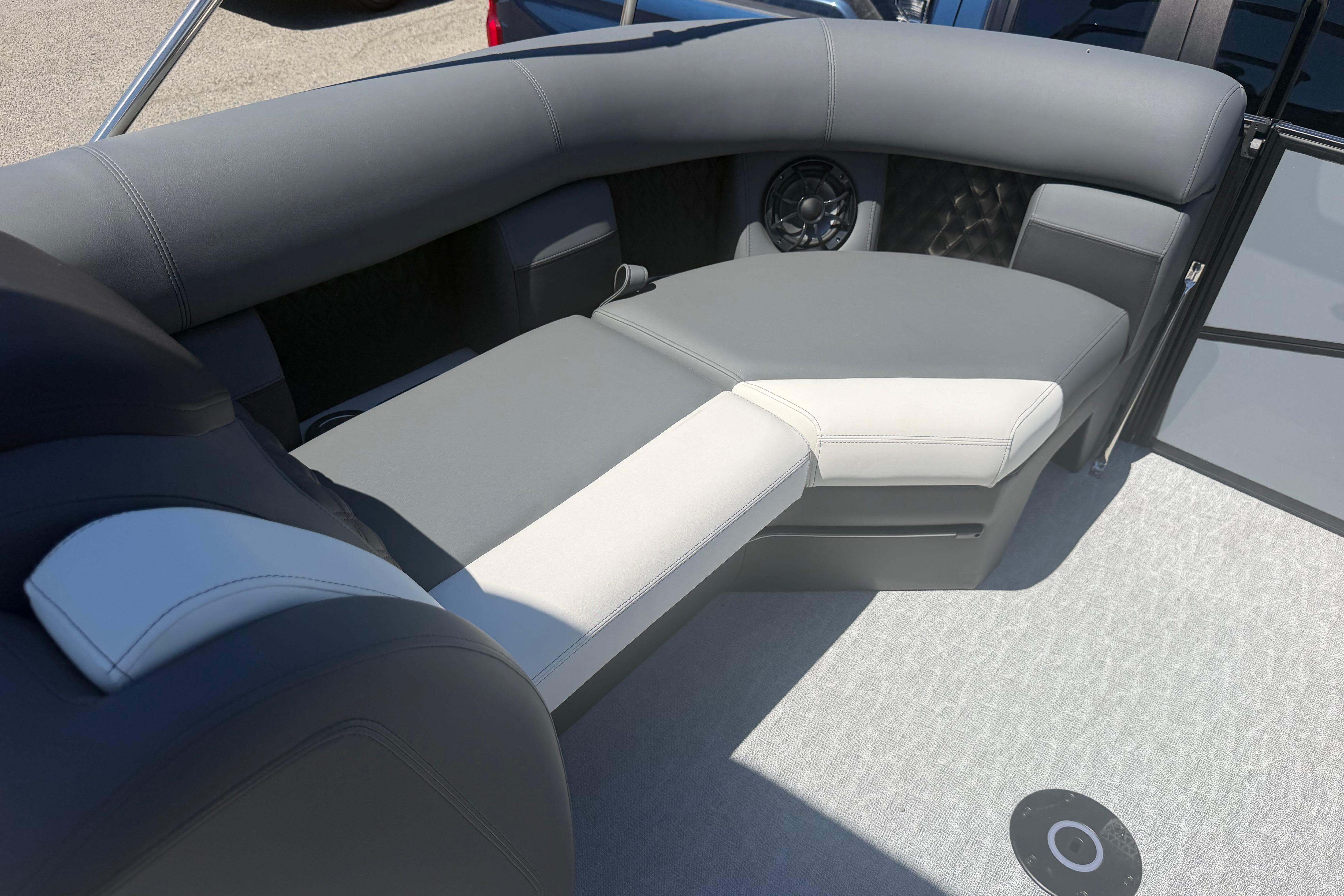 Luxurious seating on 2026 Berkshire STS 23 Ultra Lounger SportArch boat, featuring sleek design and comfort.