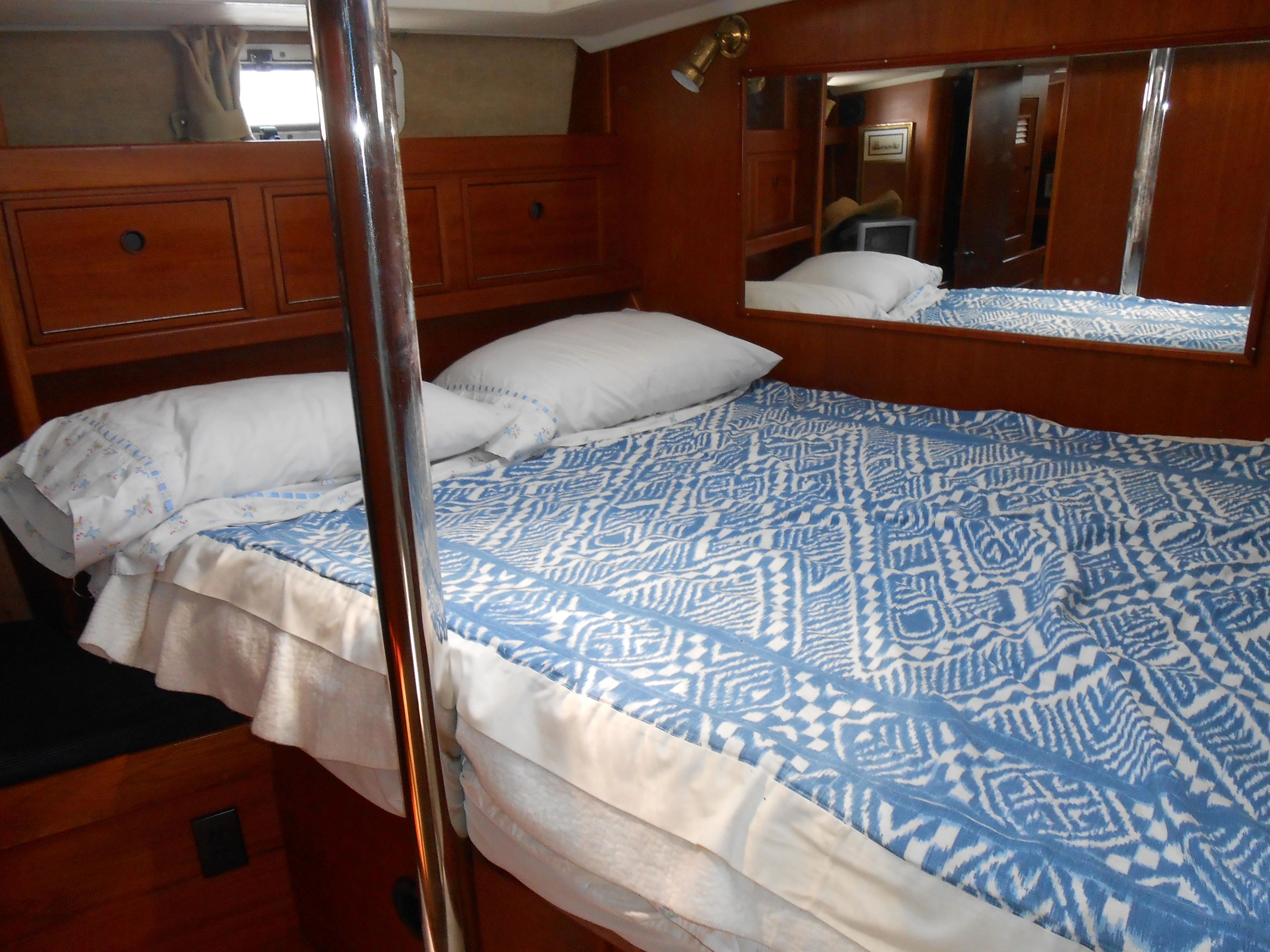 Interior of a 1985 Contest 41 Ketch with cozy bed.