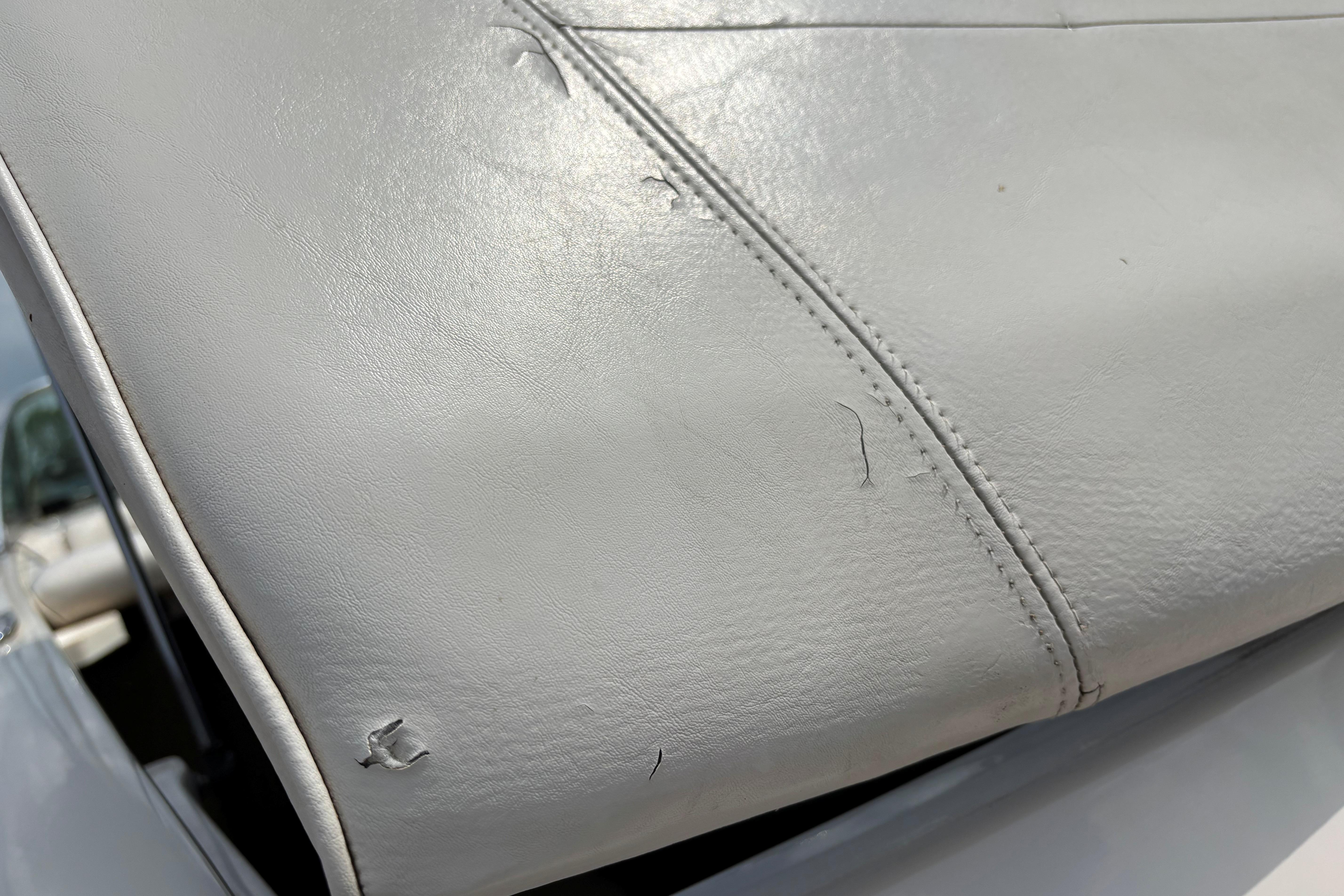 Close-up of worn upholstery on 1999 MasterCraft 205 PRO STAR boat.