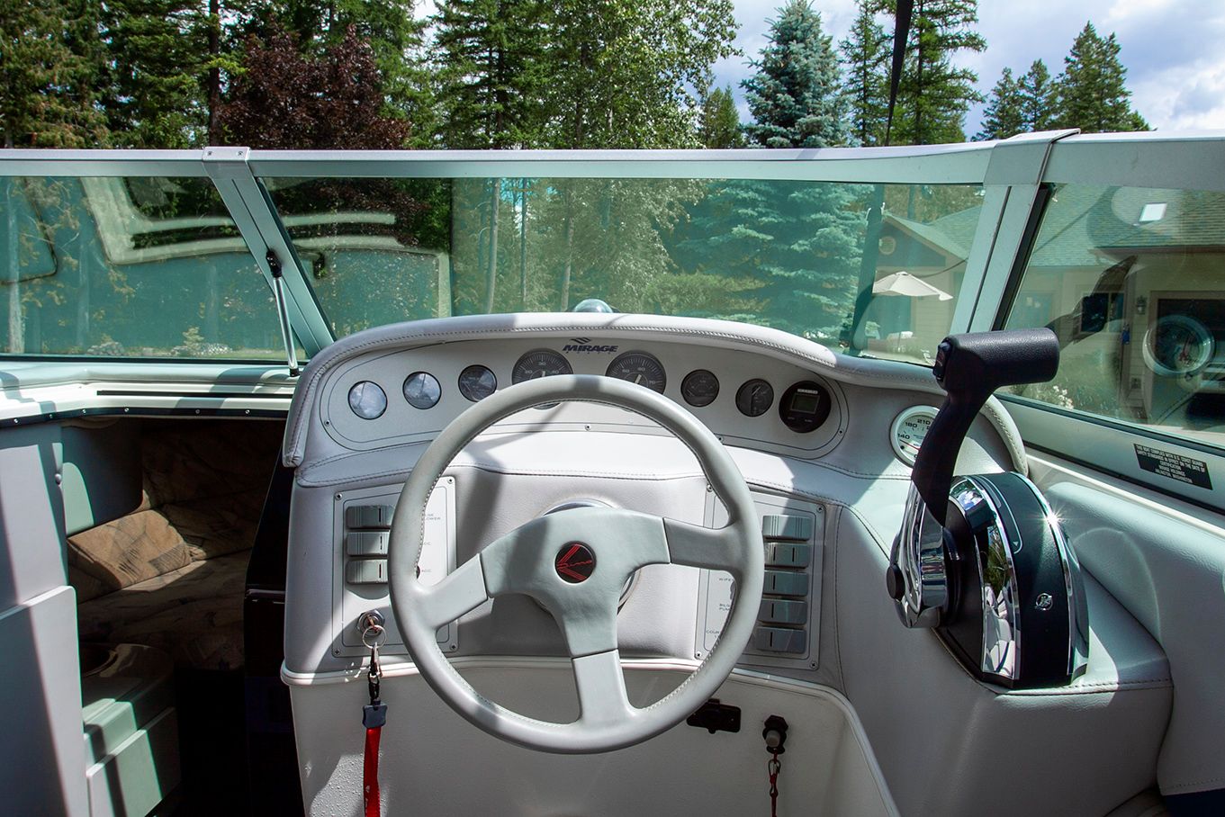 Interior view of a 1995 Mirage Trovare 275 boat cockpit.