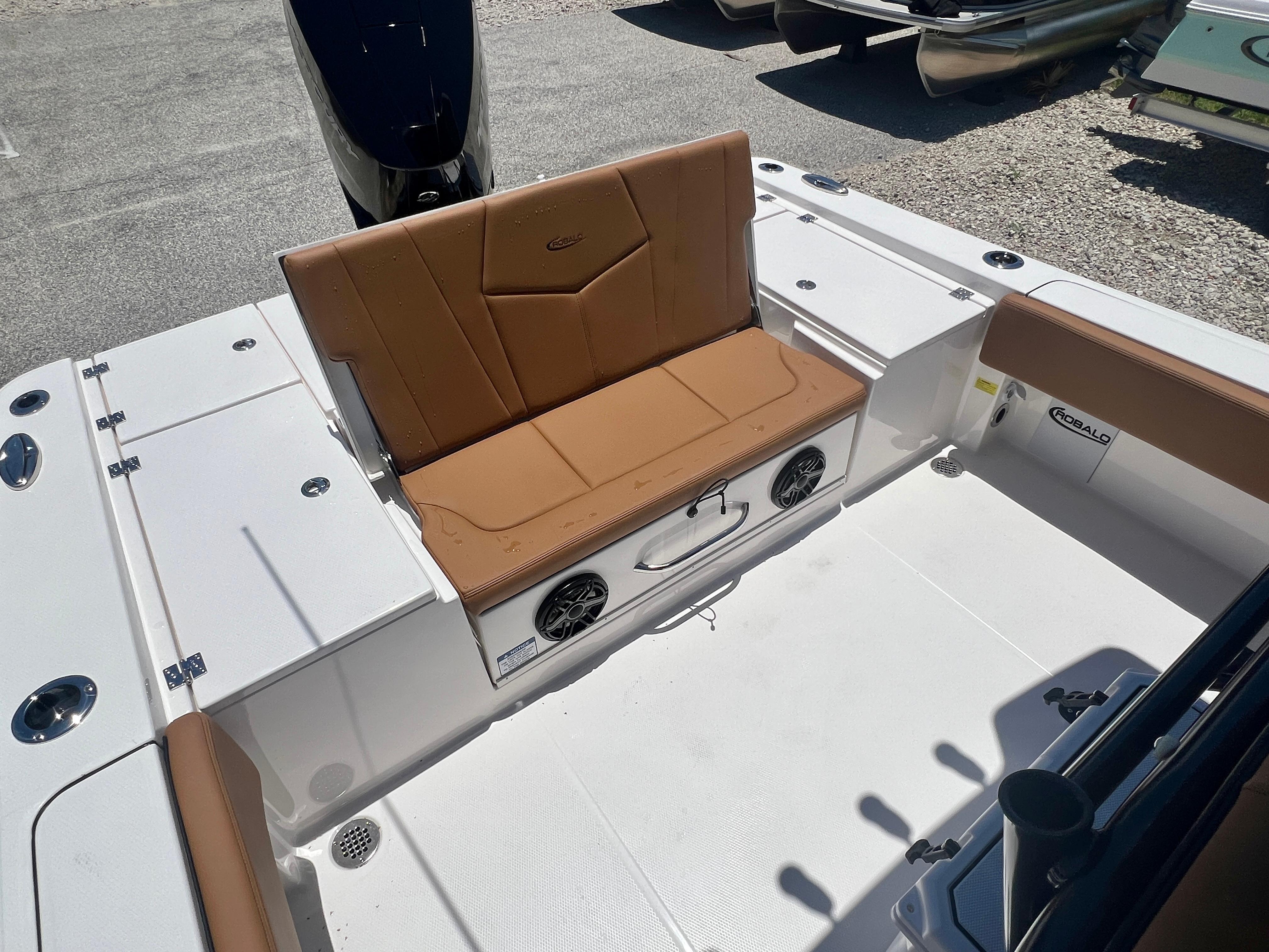2025 Robalo 266 Cayman with brown seating and speakers.