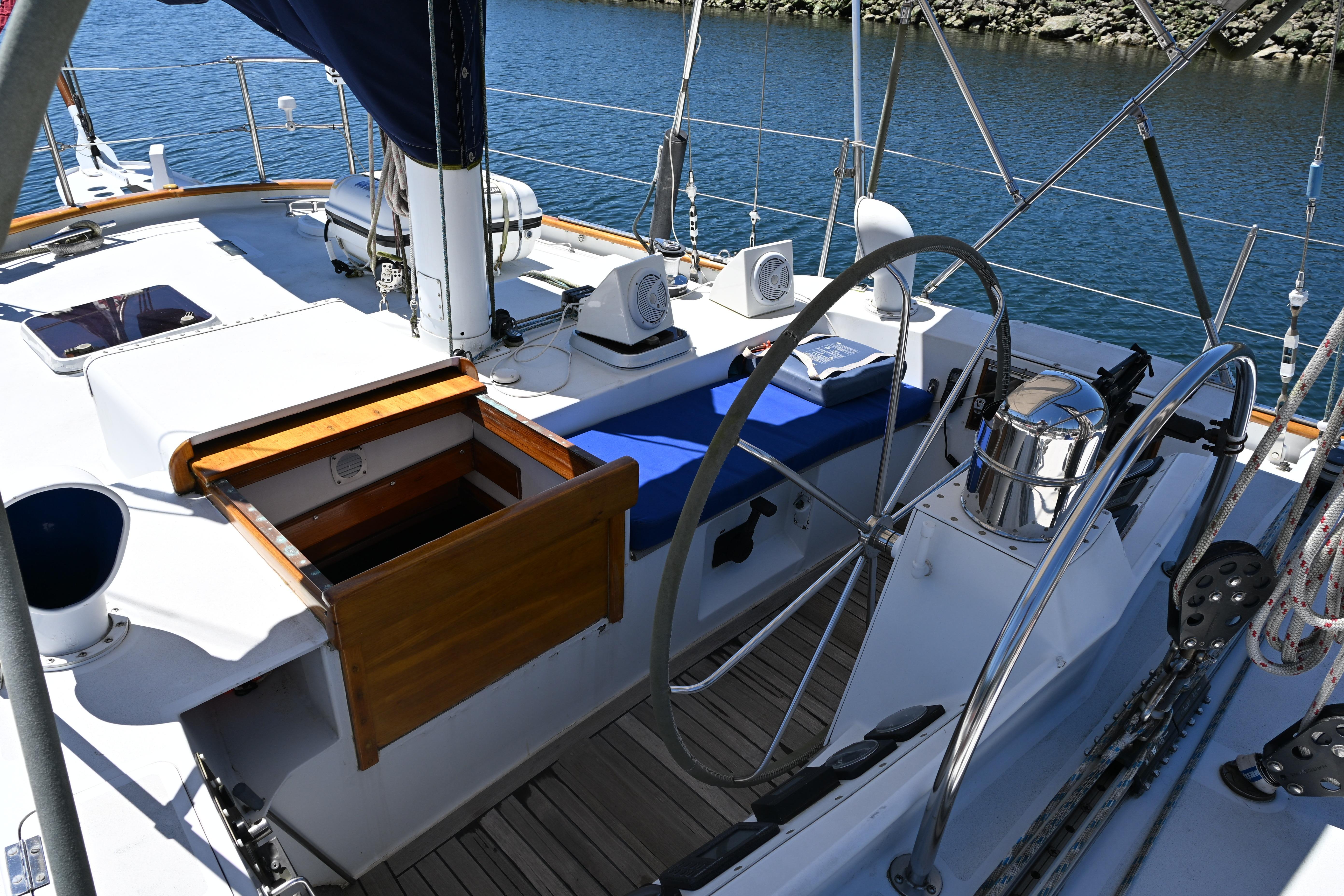 Cockpit of 1968 Abeking & Rasmussen Tripp 74 yacht with steering wheel and seating.