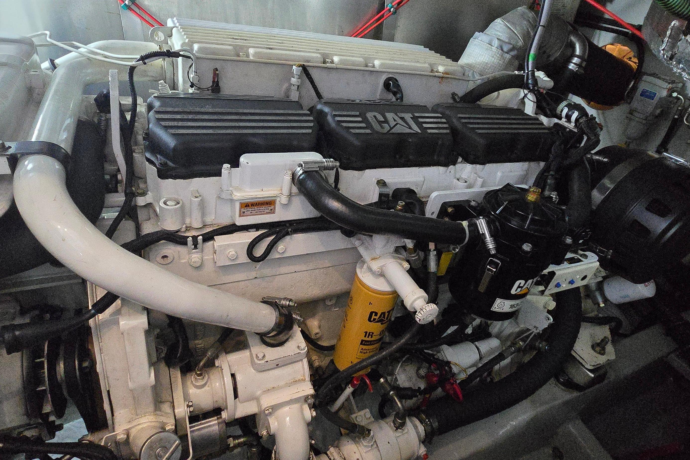 Engine of a 2004 Sunseeker Camargue 50 yacht, featuring CAT components.