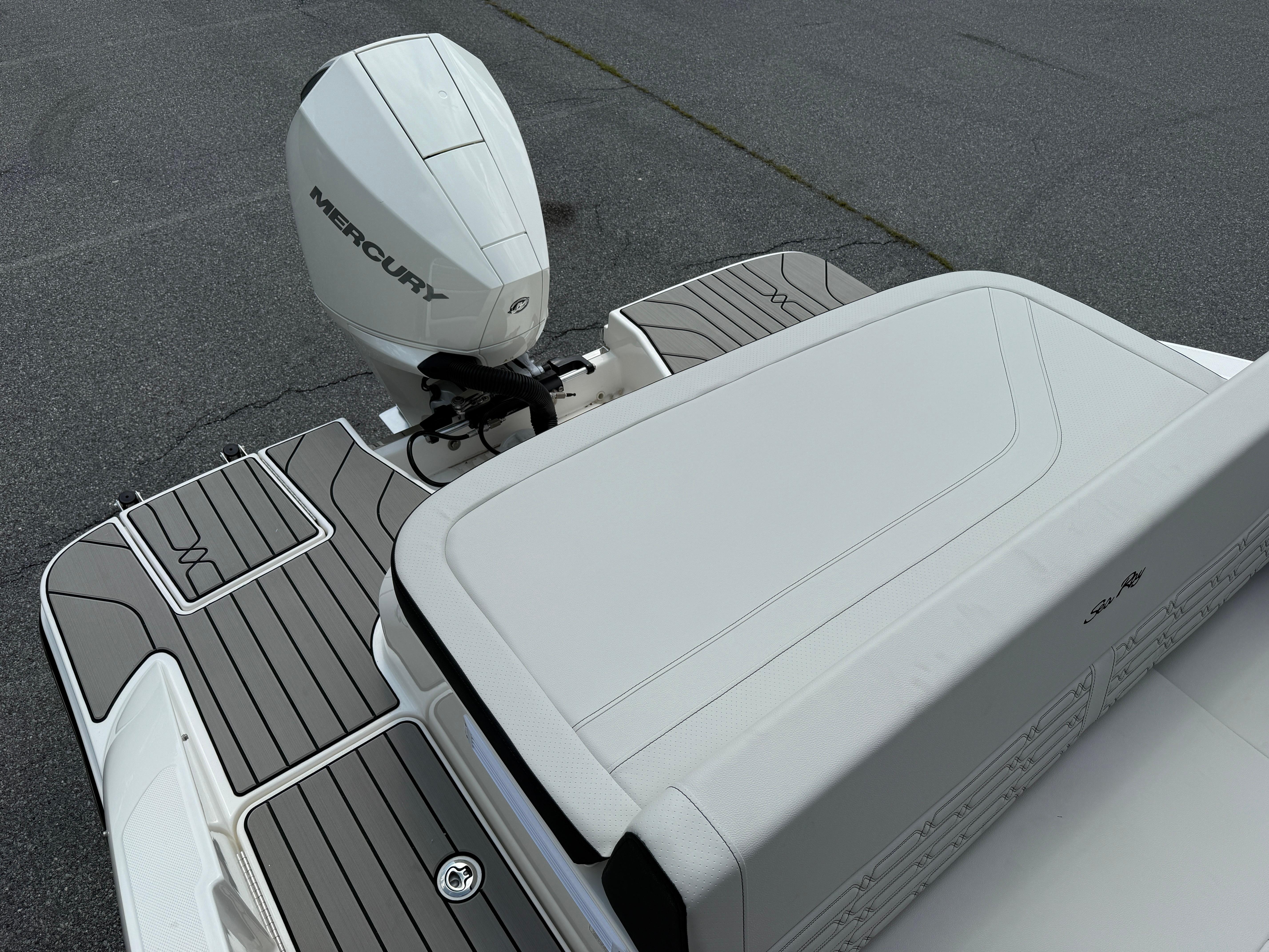 2026 Sea Ray SPX 210 Outboard boat with Mercury engine, featuring sleek deck design.