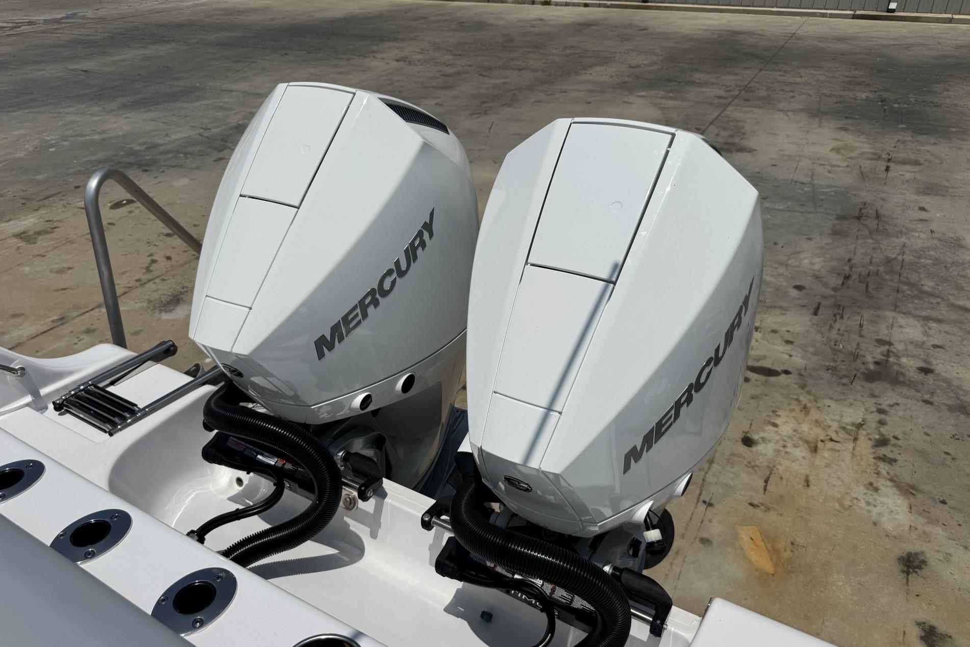 Twin Mercury outboard engines on a 2026 Sportsman Open 262 Center Console boat.