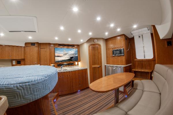 Luxurious interior of 2025 Albemarle 36 Express yacht with modern amenities and elegant wood finish.