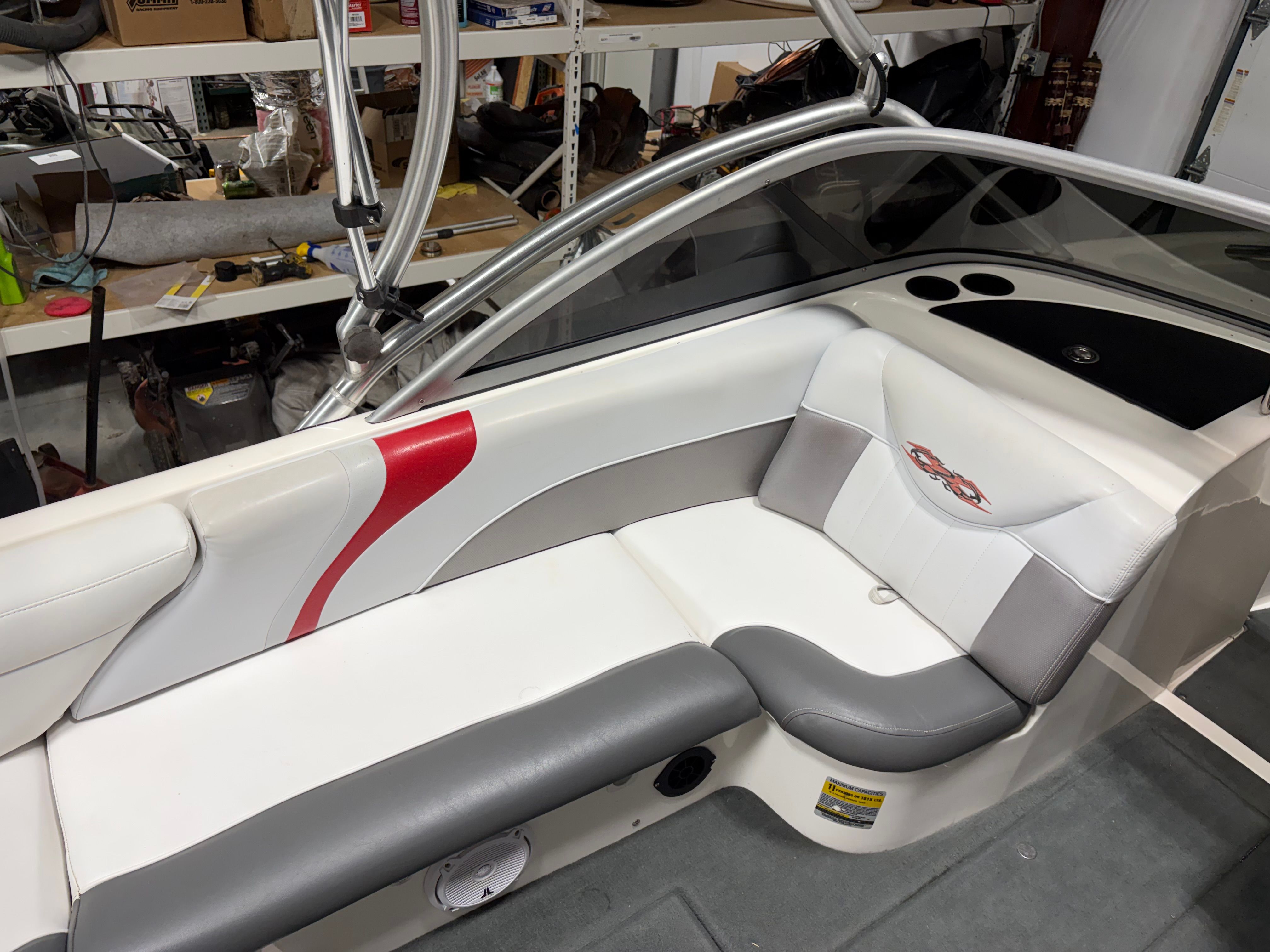 Interior of a 2004 MasterCraft X2 boat with gray and red accents.