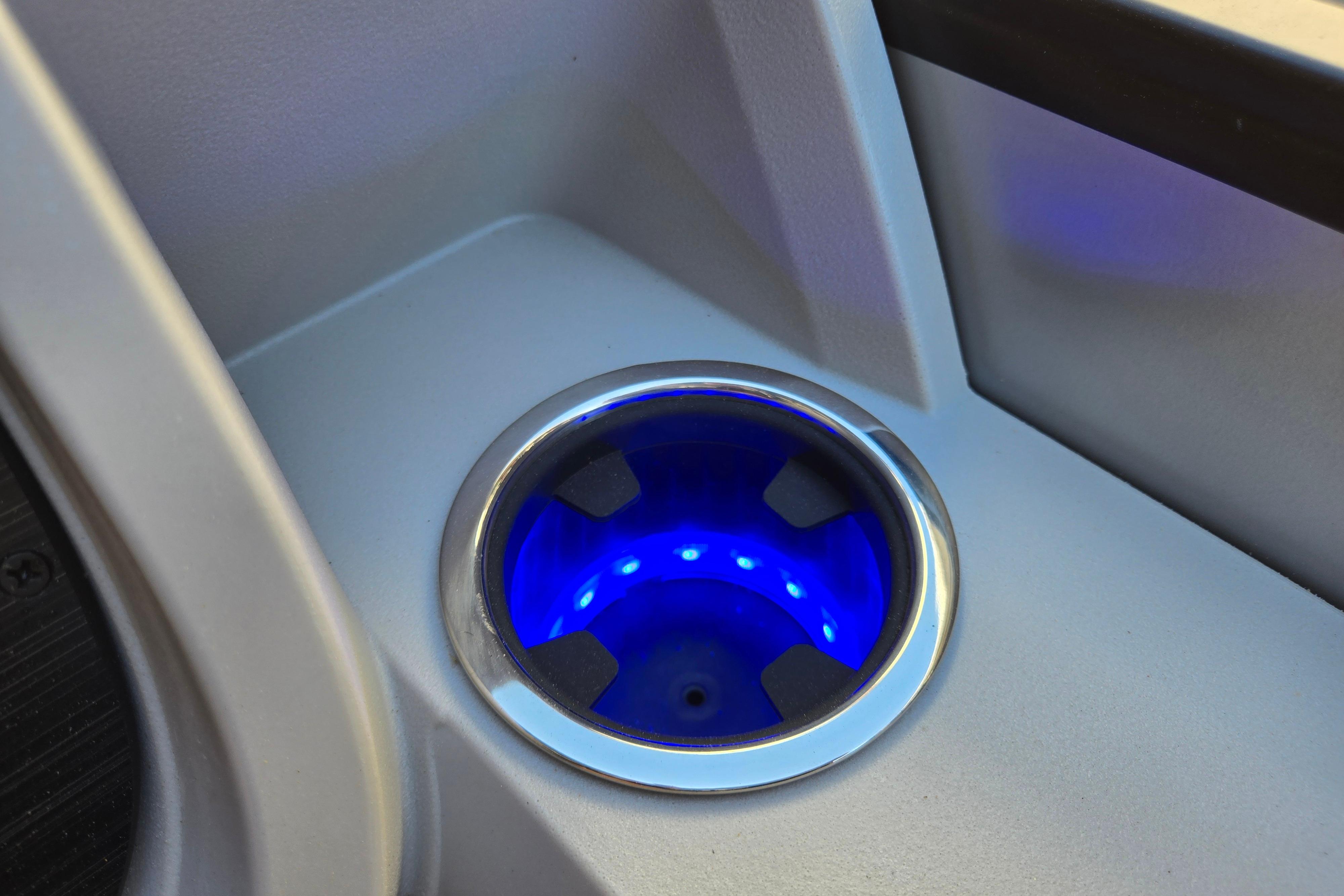 Illuminated cup holder in 2024 Godfrey Sweetwater 2486 SB boat interior.