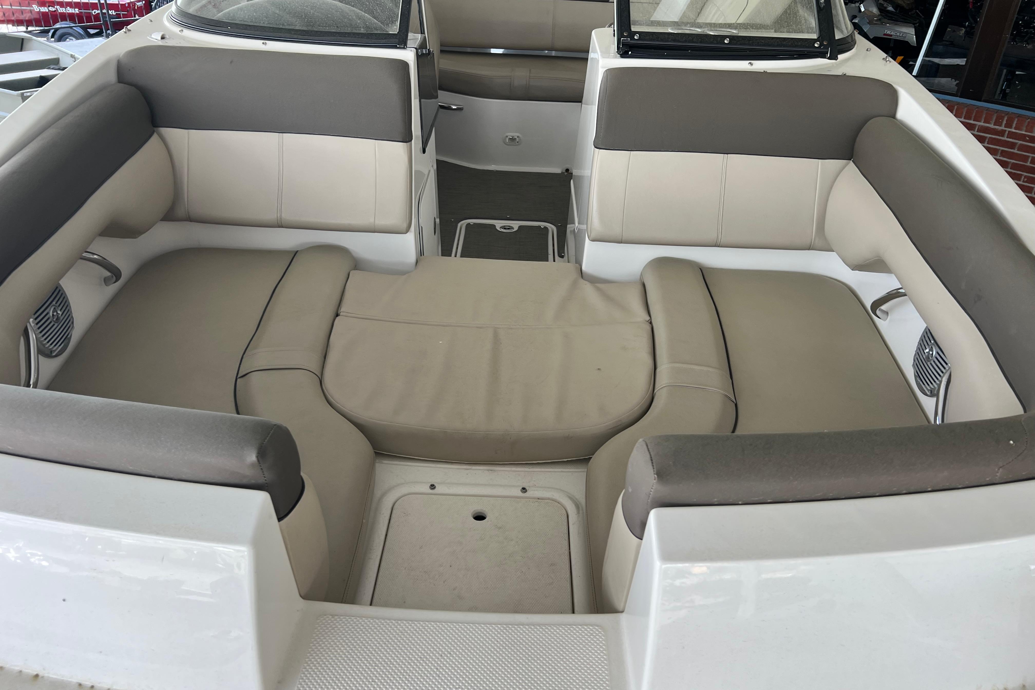 2017 Bayliner 195 Deck Boat interior with beige and gray seating.