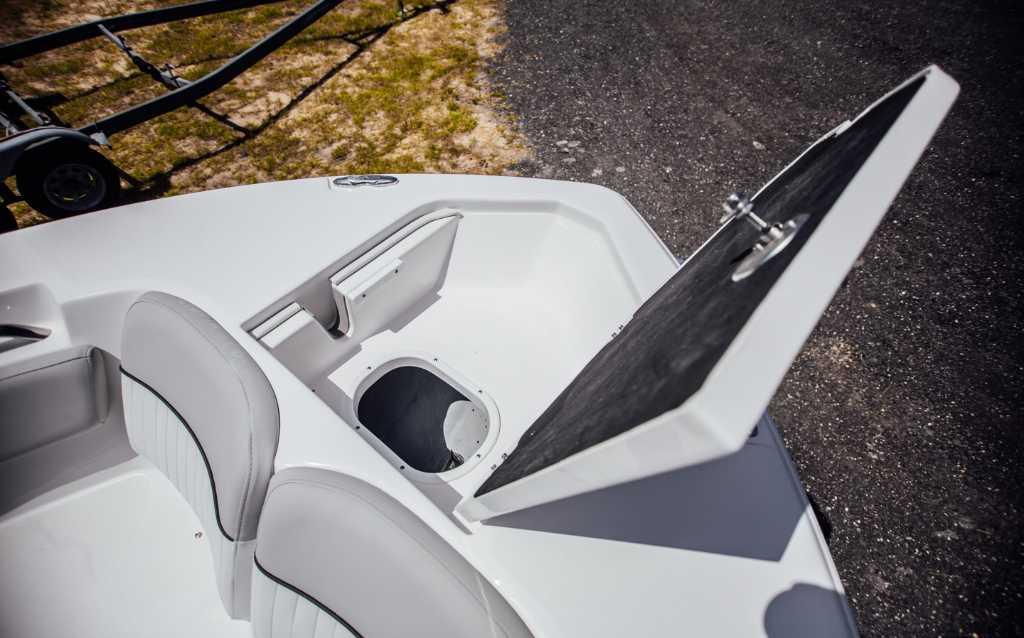 2021 Sea Fox 248 Commander boat interior with open storage compartment.
