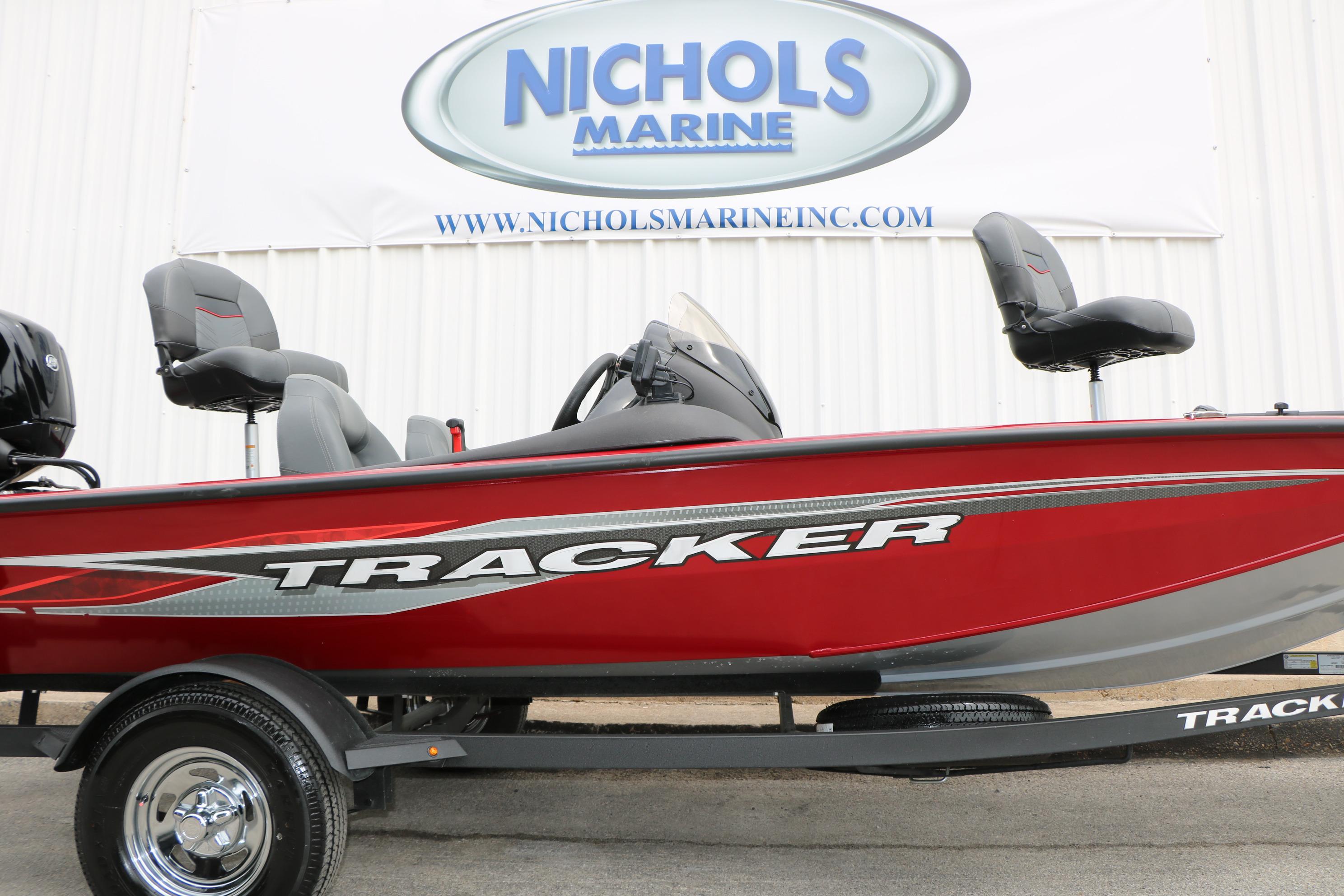 2024 Tracker Pro Team 175 boat in red, displayed at Nichols Marine dealership.