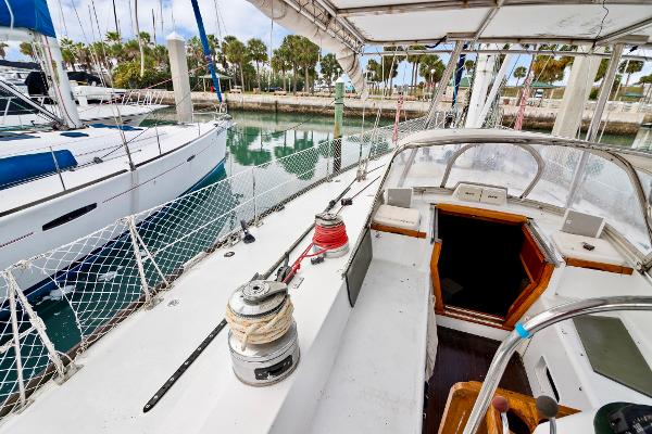 Cockpit view of a 1989 Concordia 52 sailboat docked at a marina.
