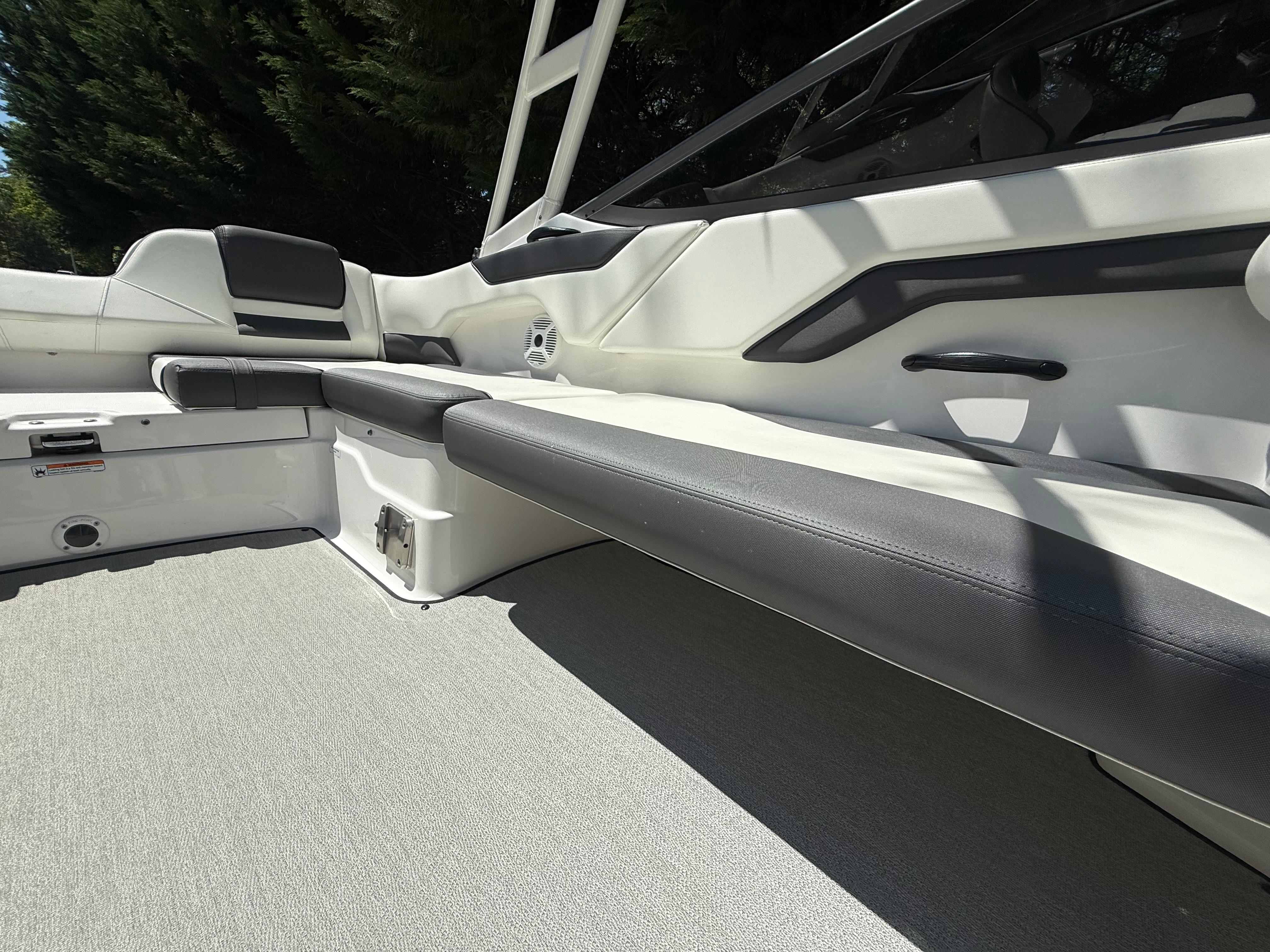 2022 Yamaha Boats AR210 interior with sleek seating and modern design.