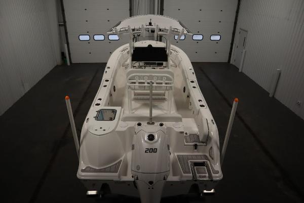 2025 Sea Fox 228 Commander boat in indoor storage facility.