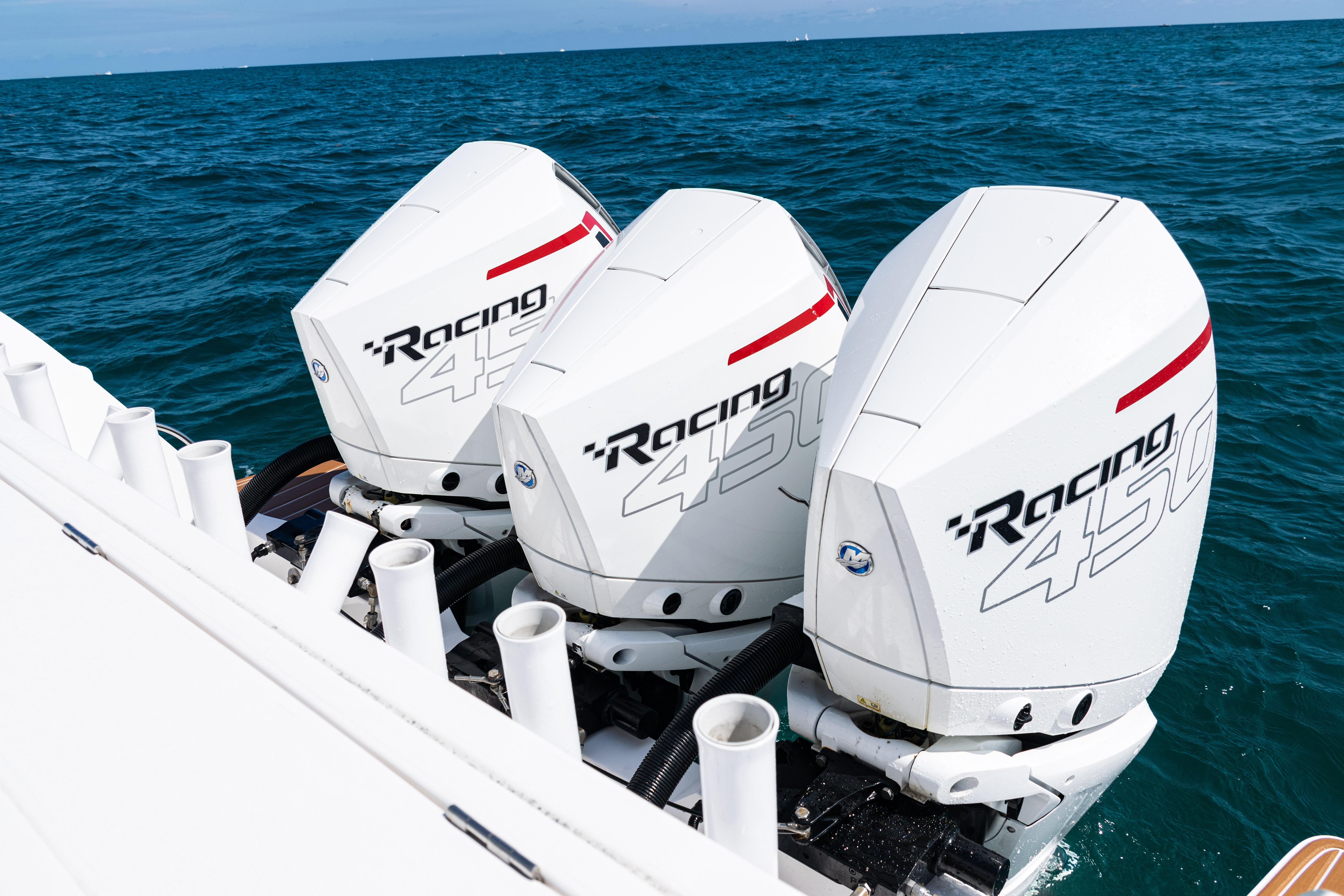Triple Mercury Racing 450 engines on 2018 Intrepid 438 Evolution boat in open sea.