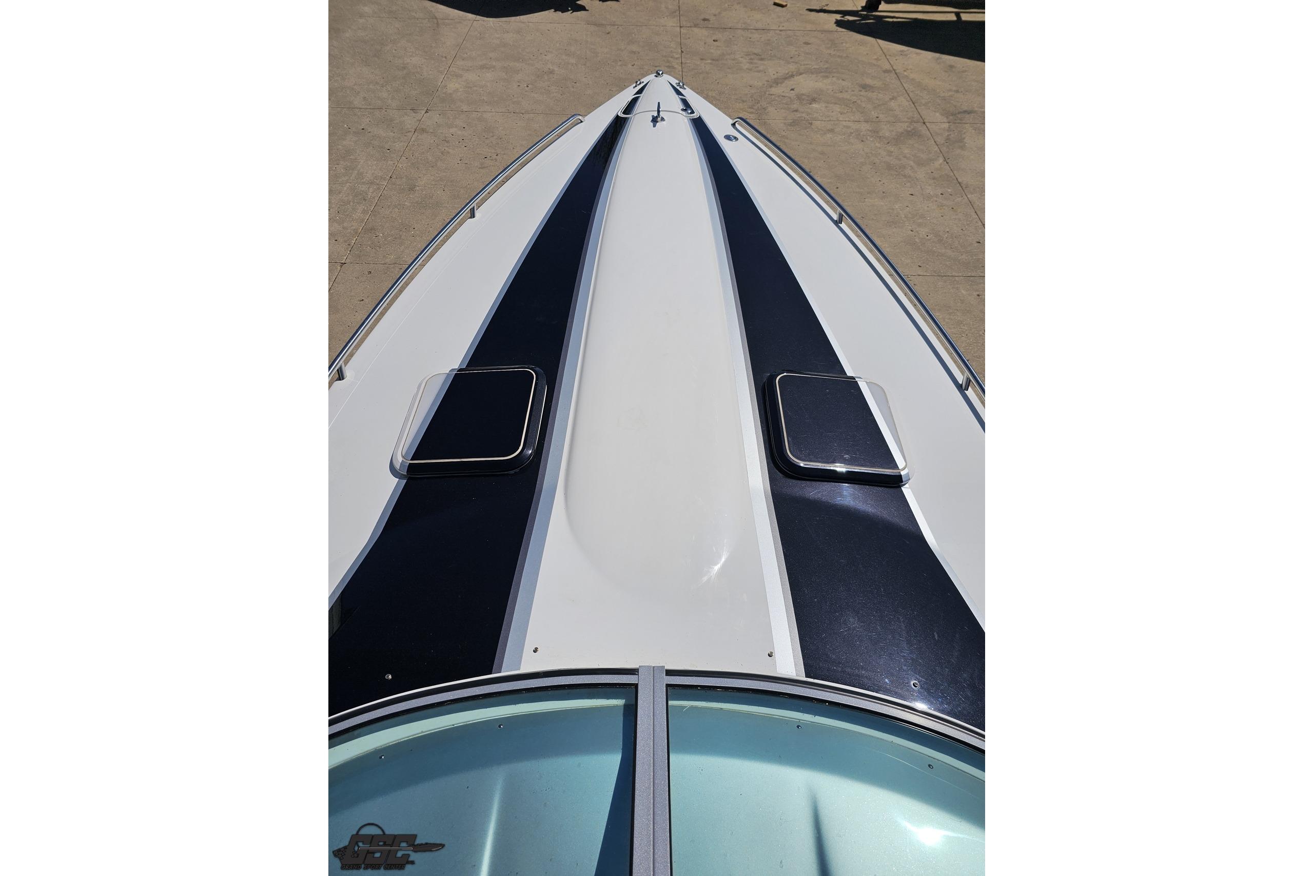 2014 Formula 292 FASTech boat deck with sleek black and white design.