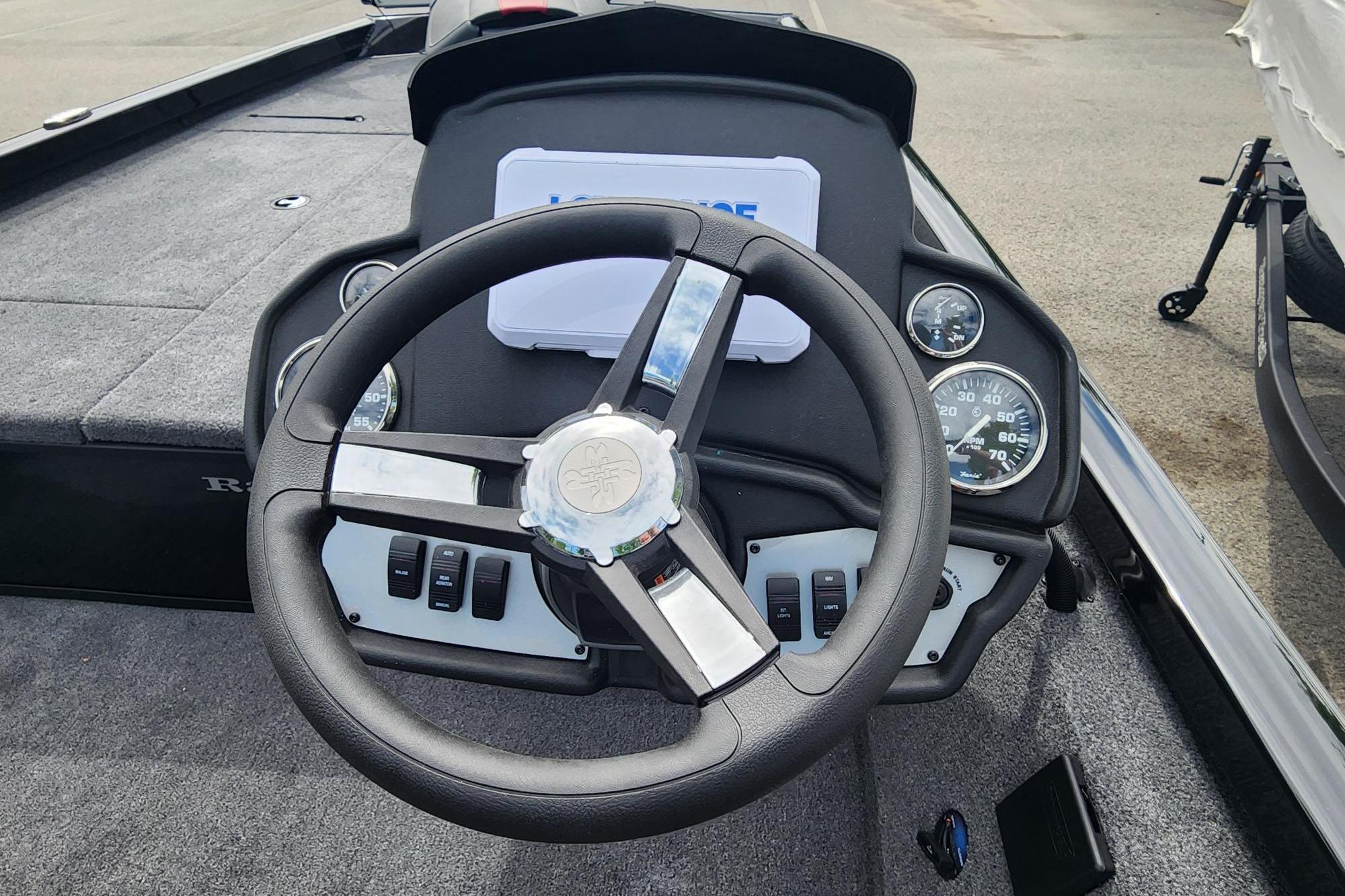 2026 Ranger RT188 boat dashboard with steering wheel and gauges.