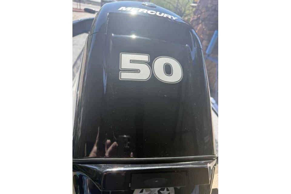 Mercury 50 horsepower outboard motor on Tracker Super Guide V-16 SC, 2026 model.