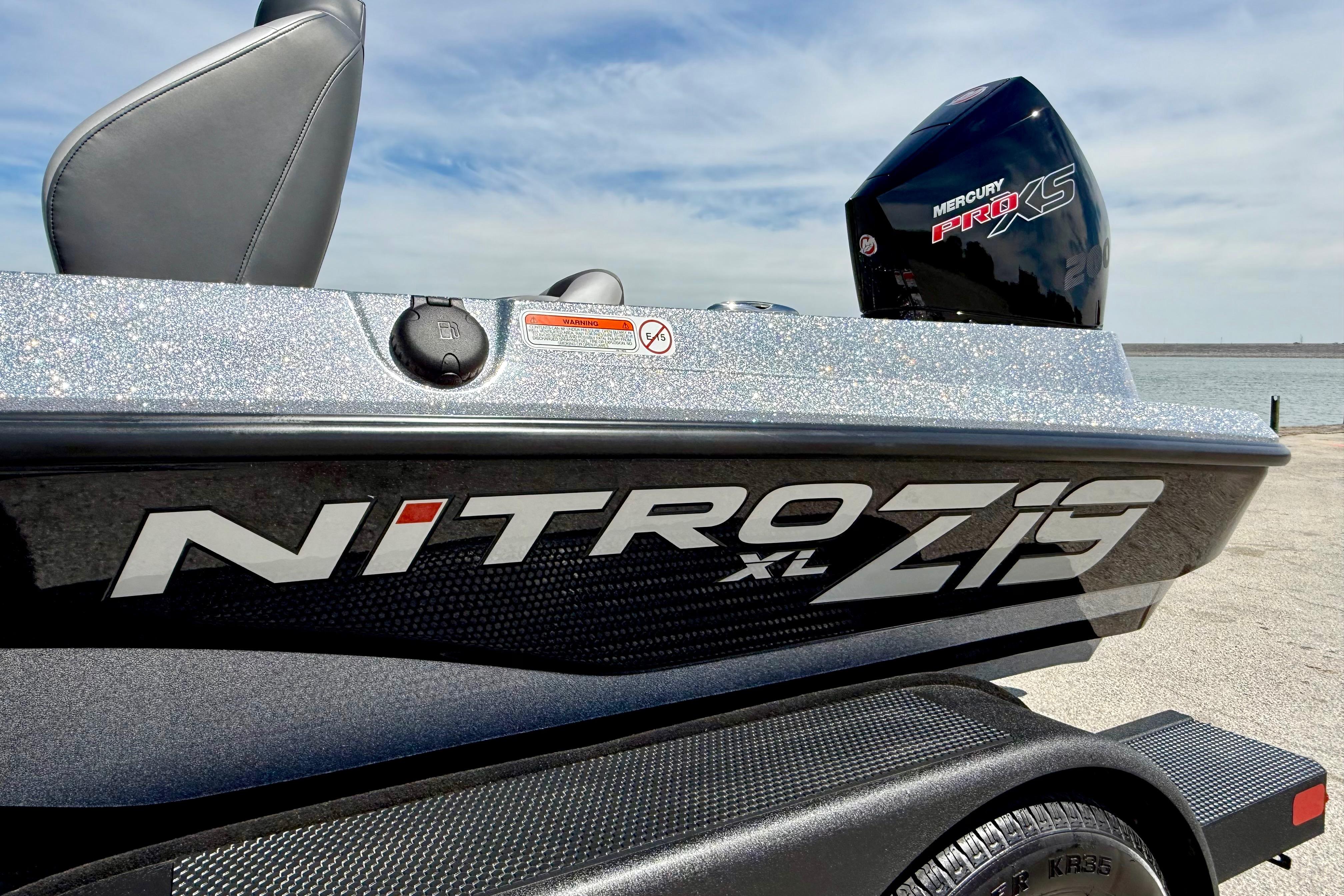 2026 Nitro Z19 XL boat with Mercury Pro XS engine by the water.