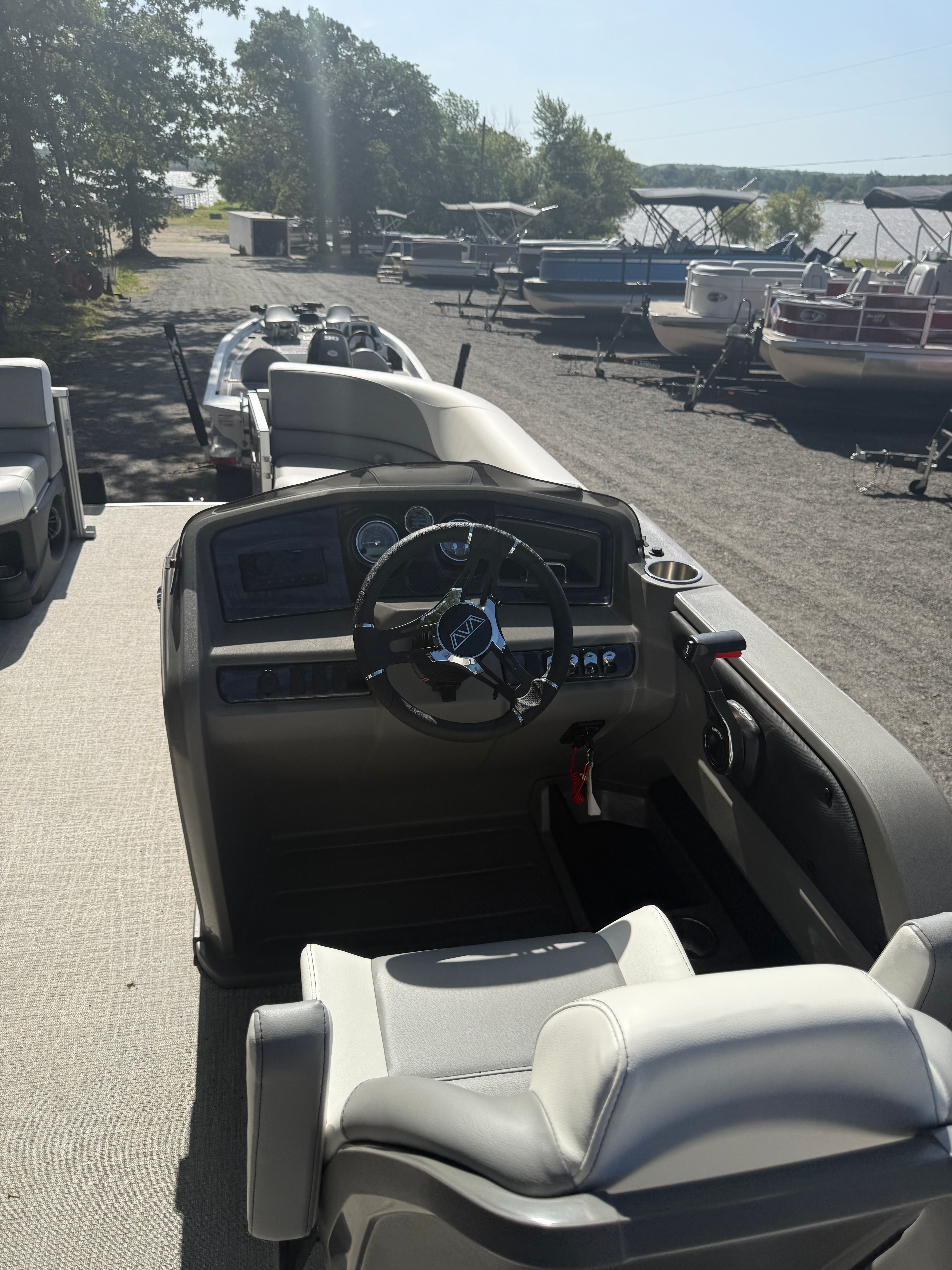2025 Tahoe LTZ Quad Lounger 2585 pontoon boat cockpit view.