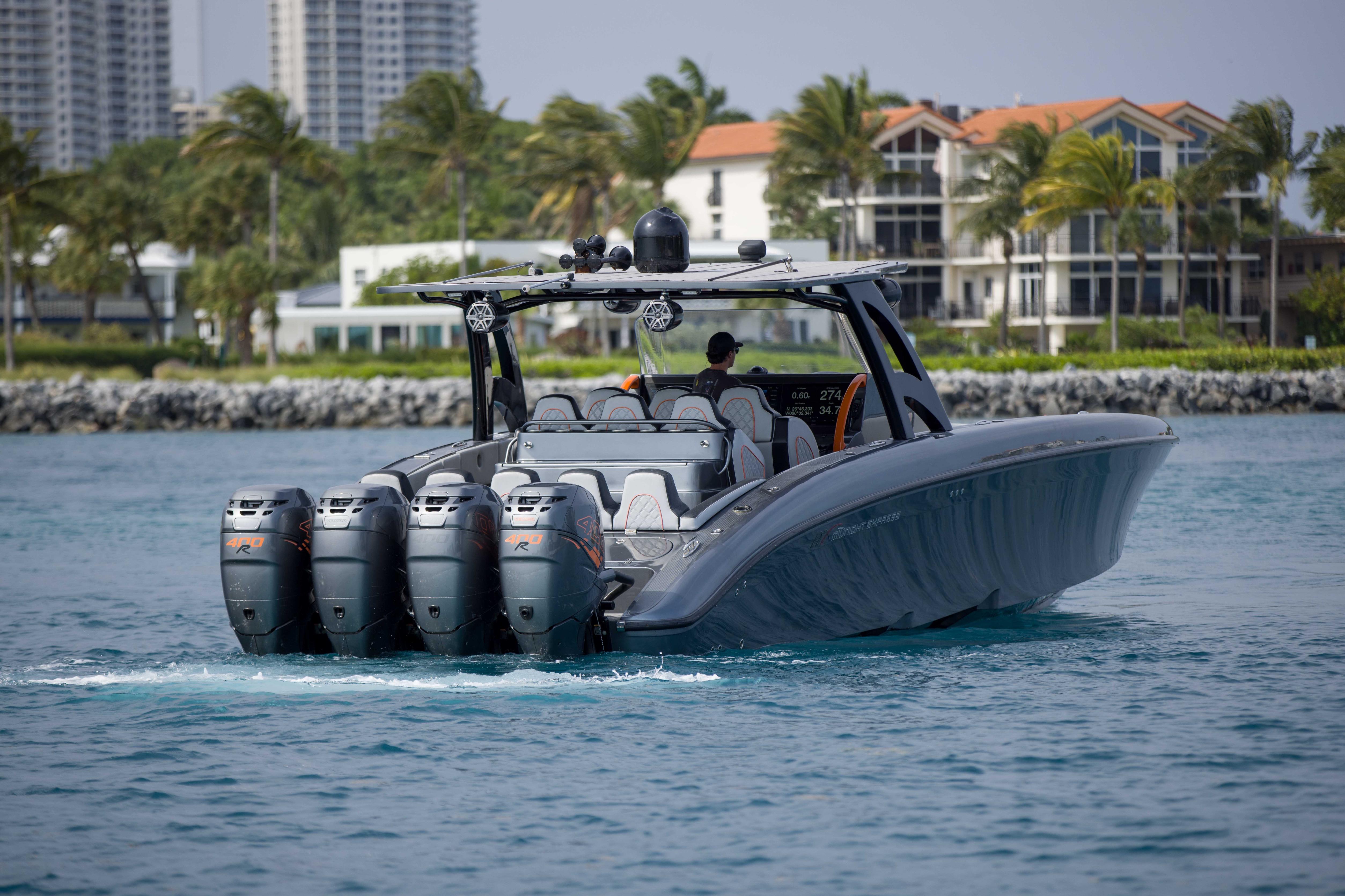 2019 Midnight Express 43 Open boat cruising on water with multiple outboard engines.