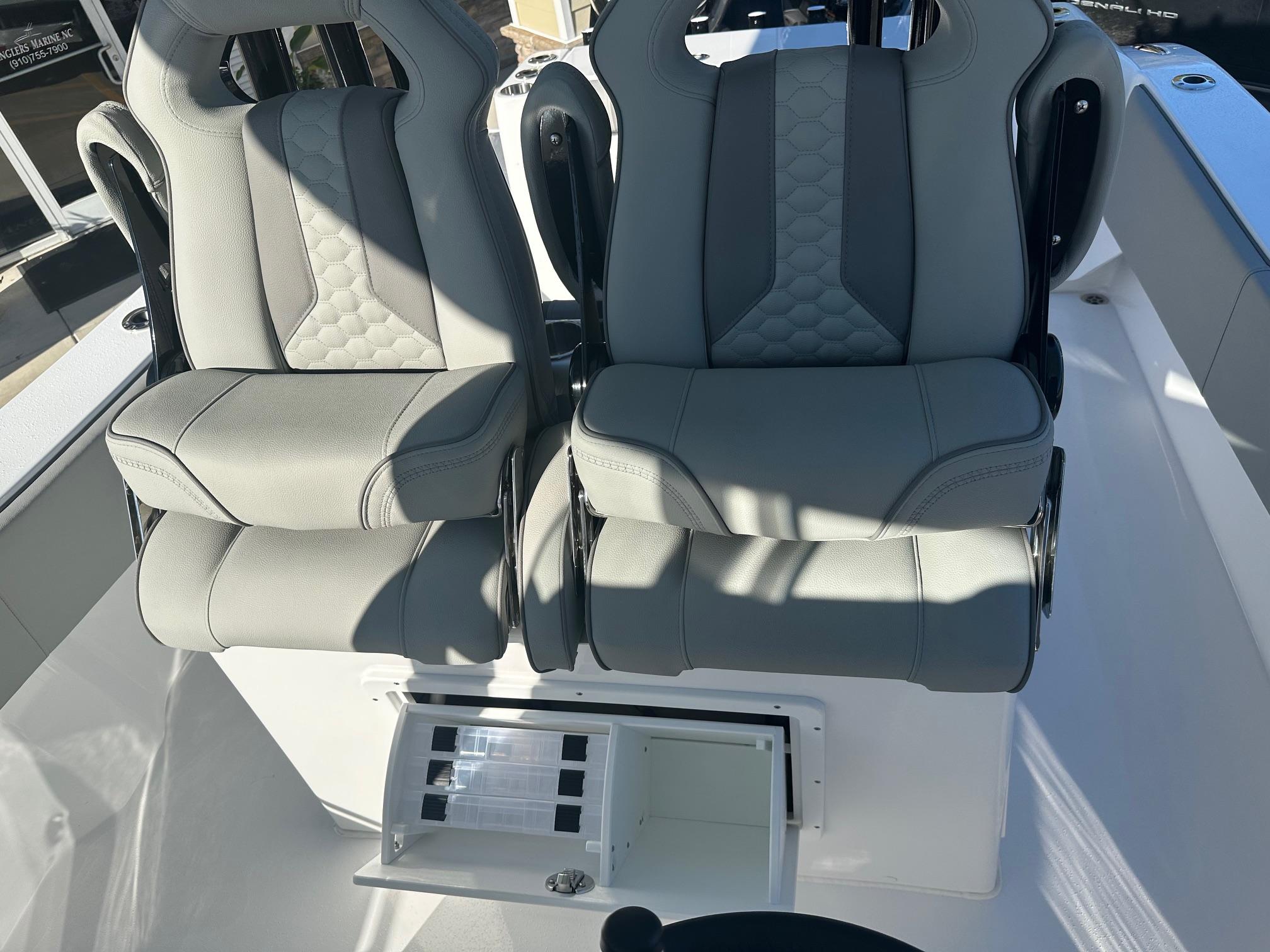 2025 Cape Horn 28XS boat seats with storage compartment, featuring modern design and comfort.