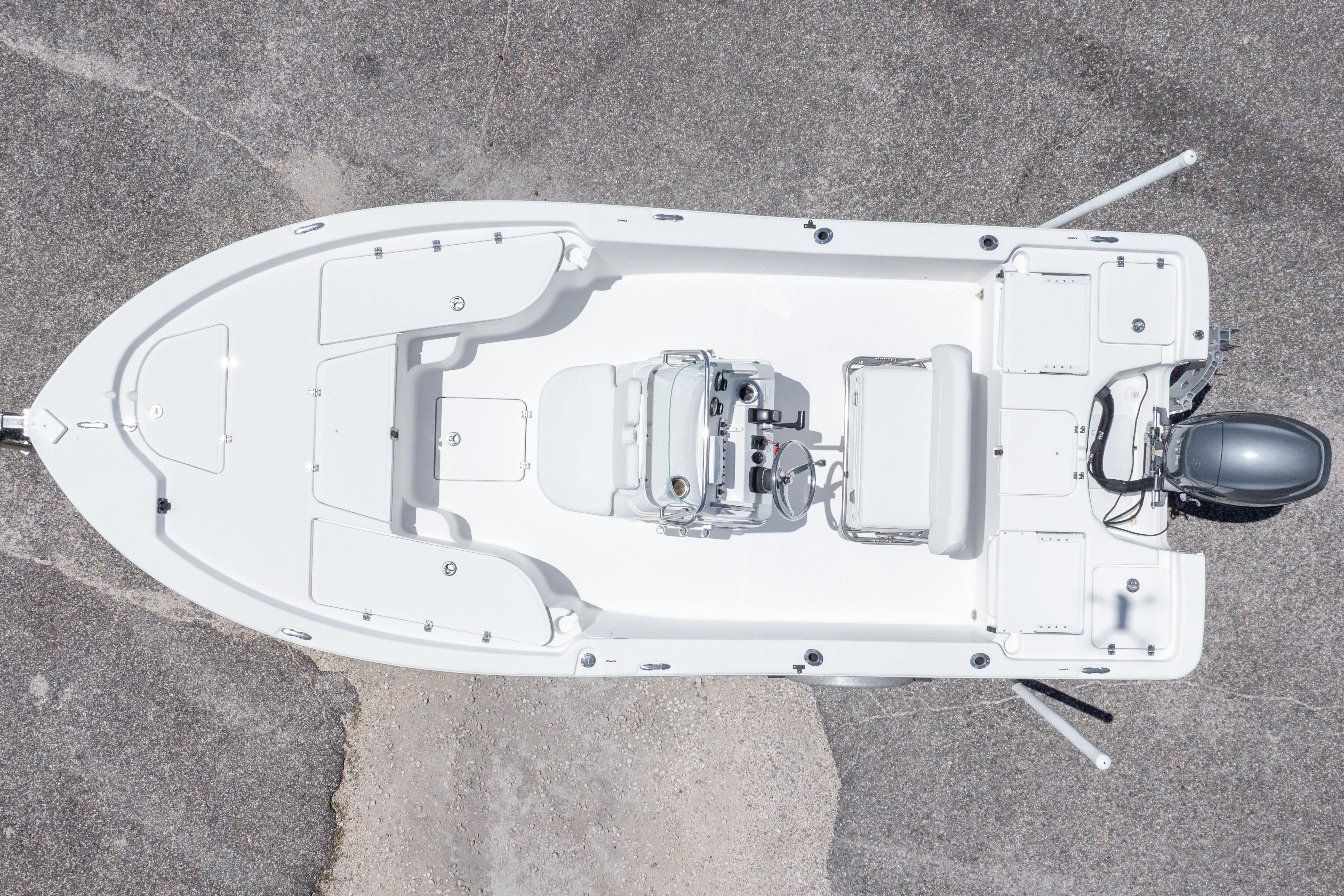 Overhead view of a 2011 Sea Fox 200XT boat on a concrete surface.