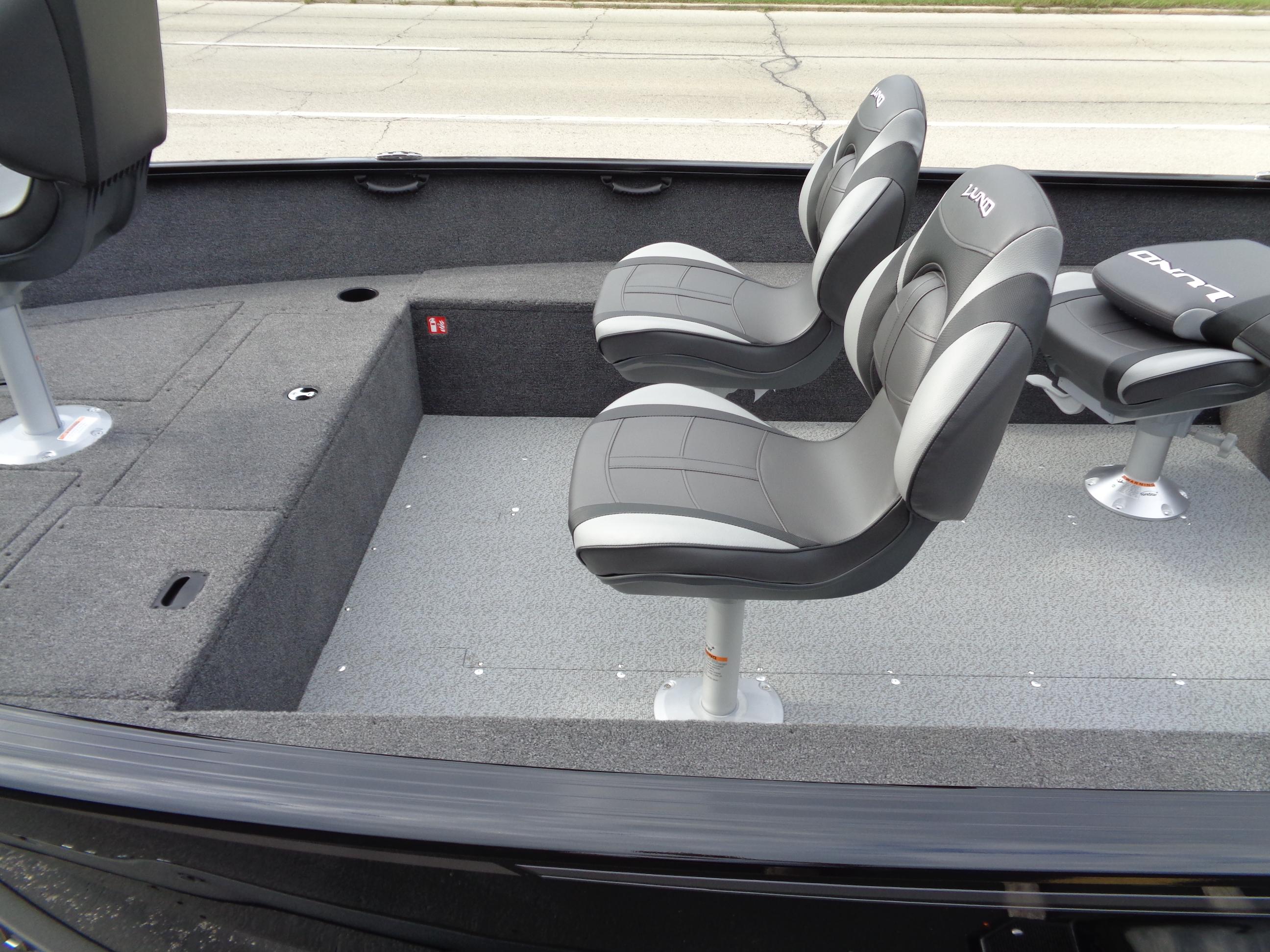 2025 Lund 1650 Rebel XL Tiller boat interior with two gray seats.