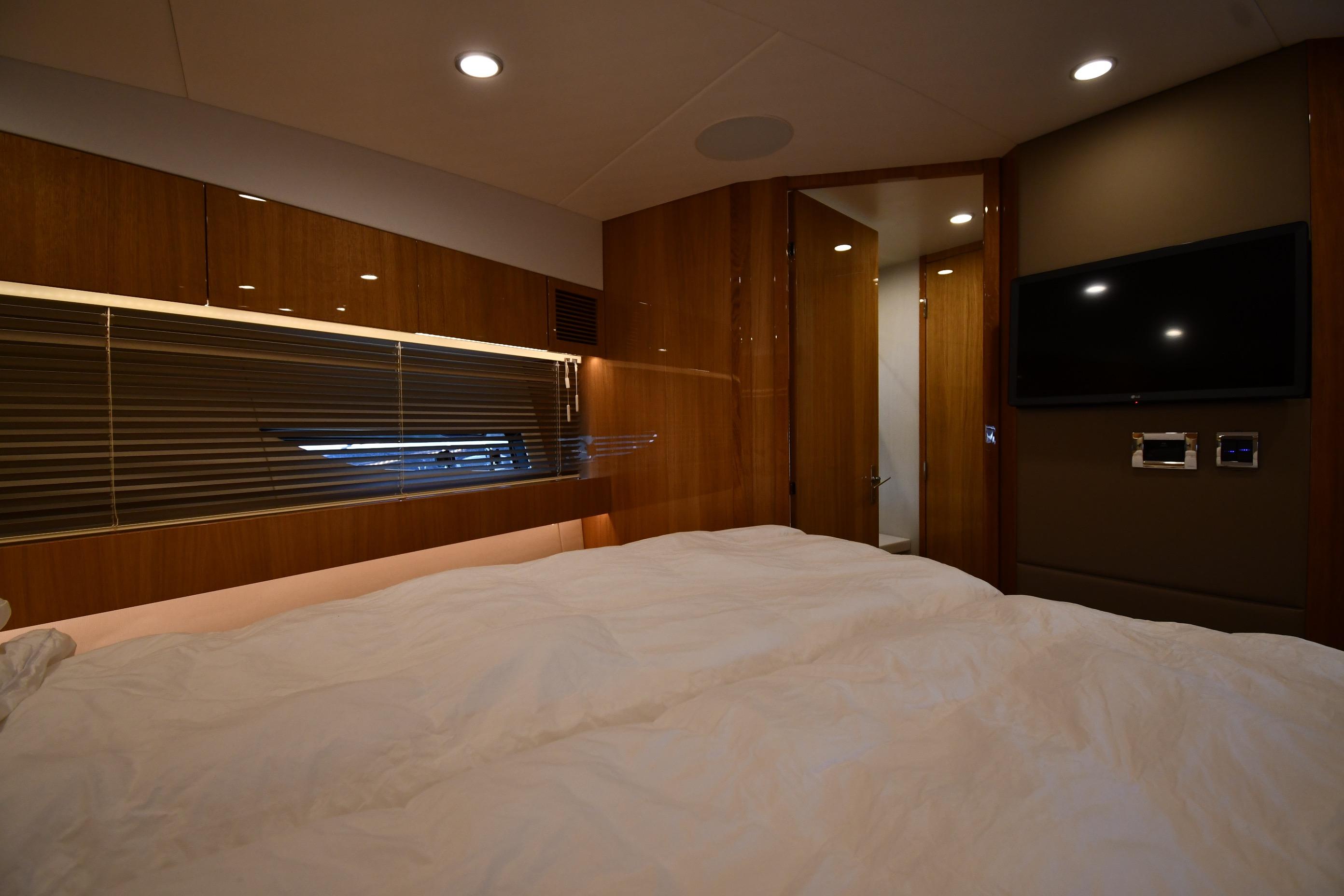Luxurious cabin interior of 2024 Fairline G50 Targa yacht with modern amenities.