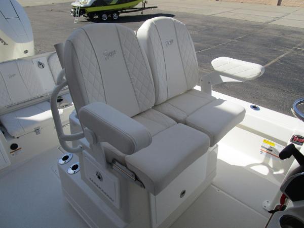 2024 Ranger 2660 Bay boat with luxurious white seating and armrests.